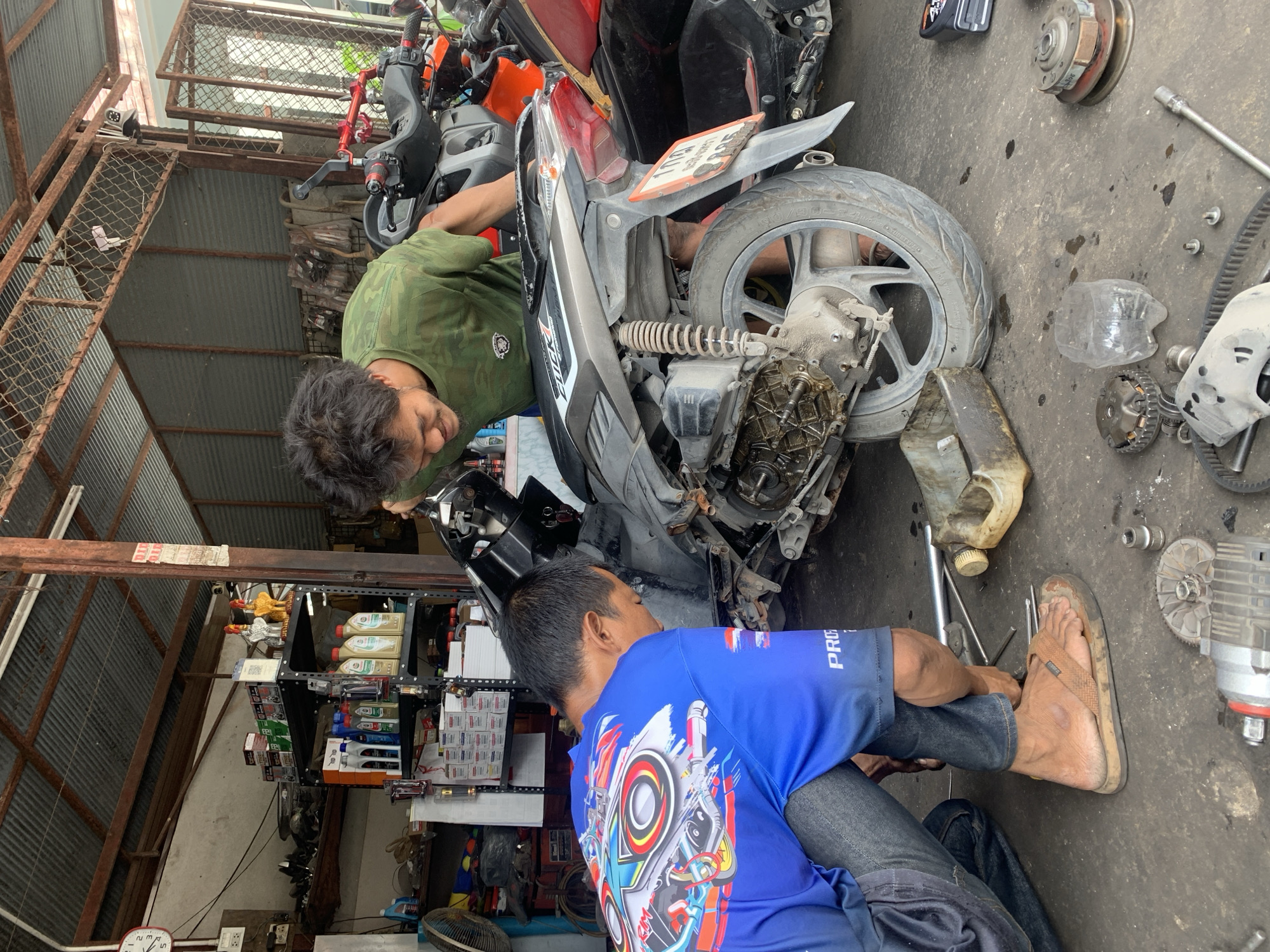 Motorbike repair and religious art observed in Thai coastal communities