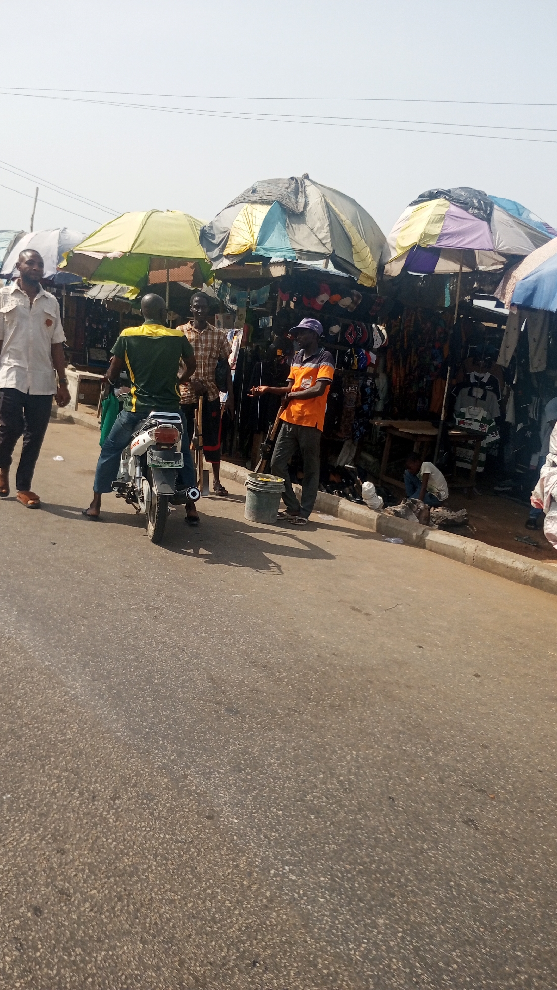 Morning market activity observed in Lokoja, Nigeria street scene