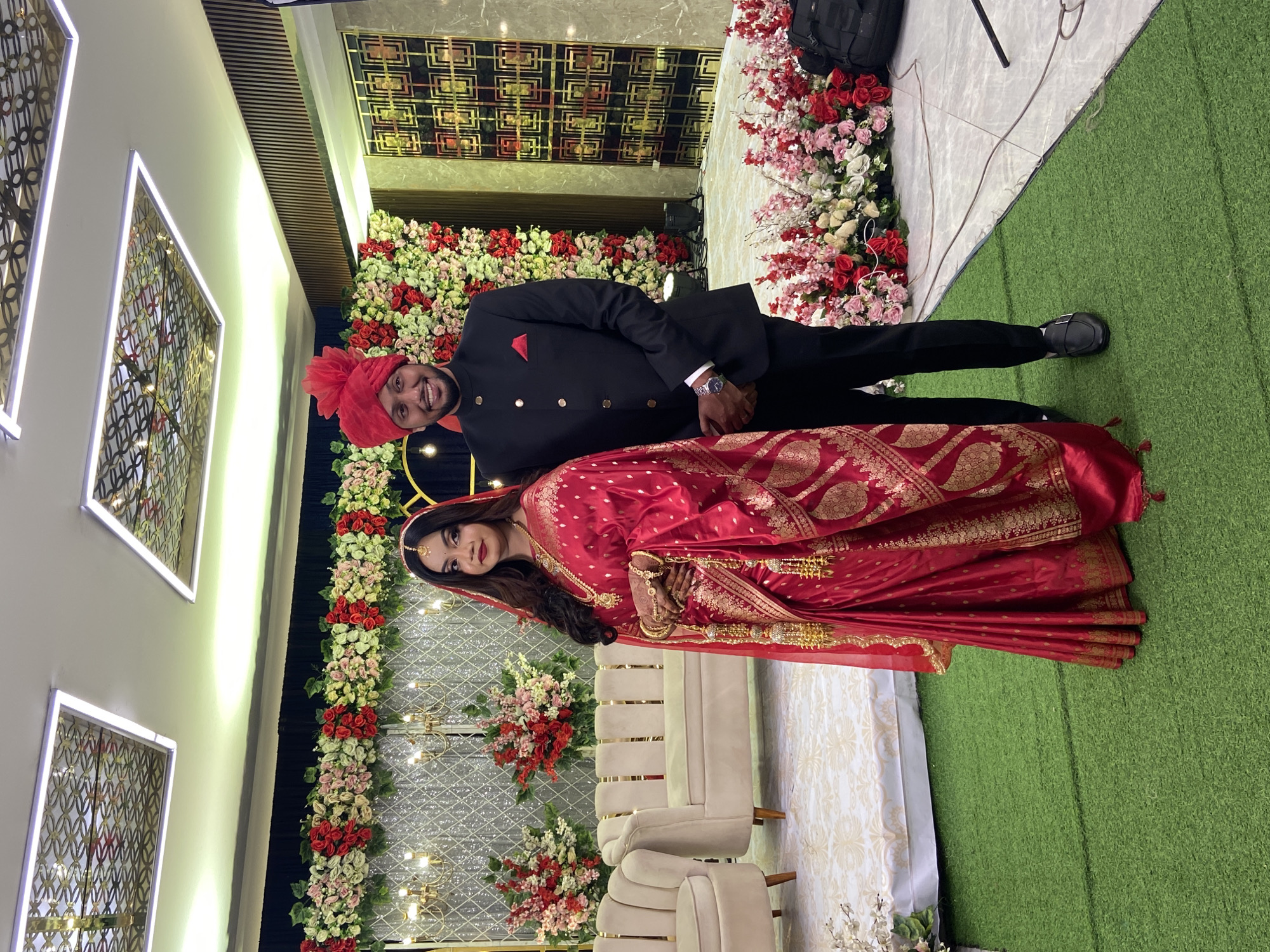 Wedding celebration captured in Dhaka with traditional attire and elaborate decorations