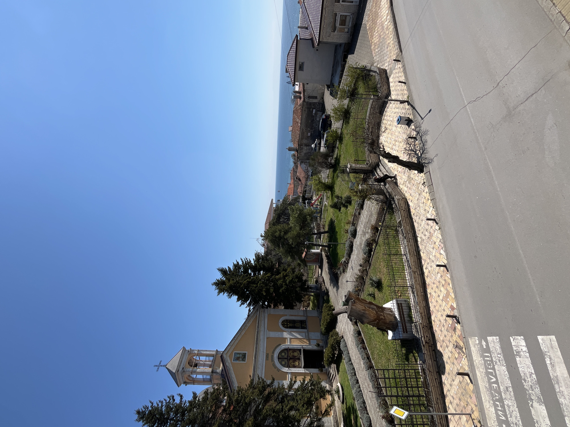 Yellow church with bell tower photographed in Balchik, Bulgaria