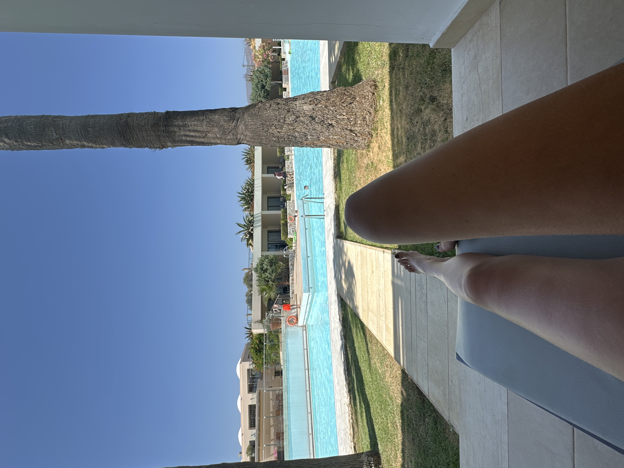 Relaxing poolside at a Greek resort in Tavronitis