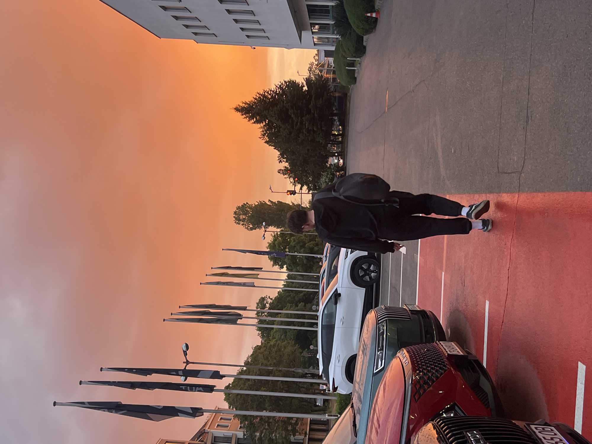 Sunset rainbow observed over wet Sofia streets