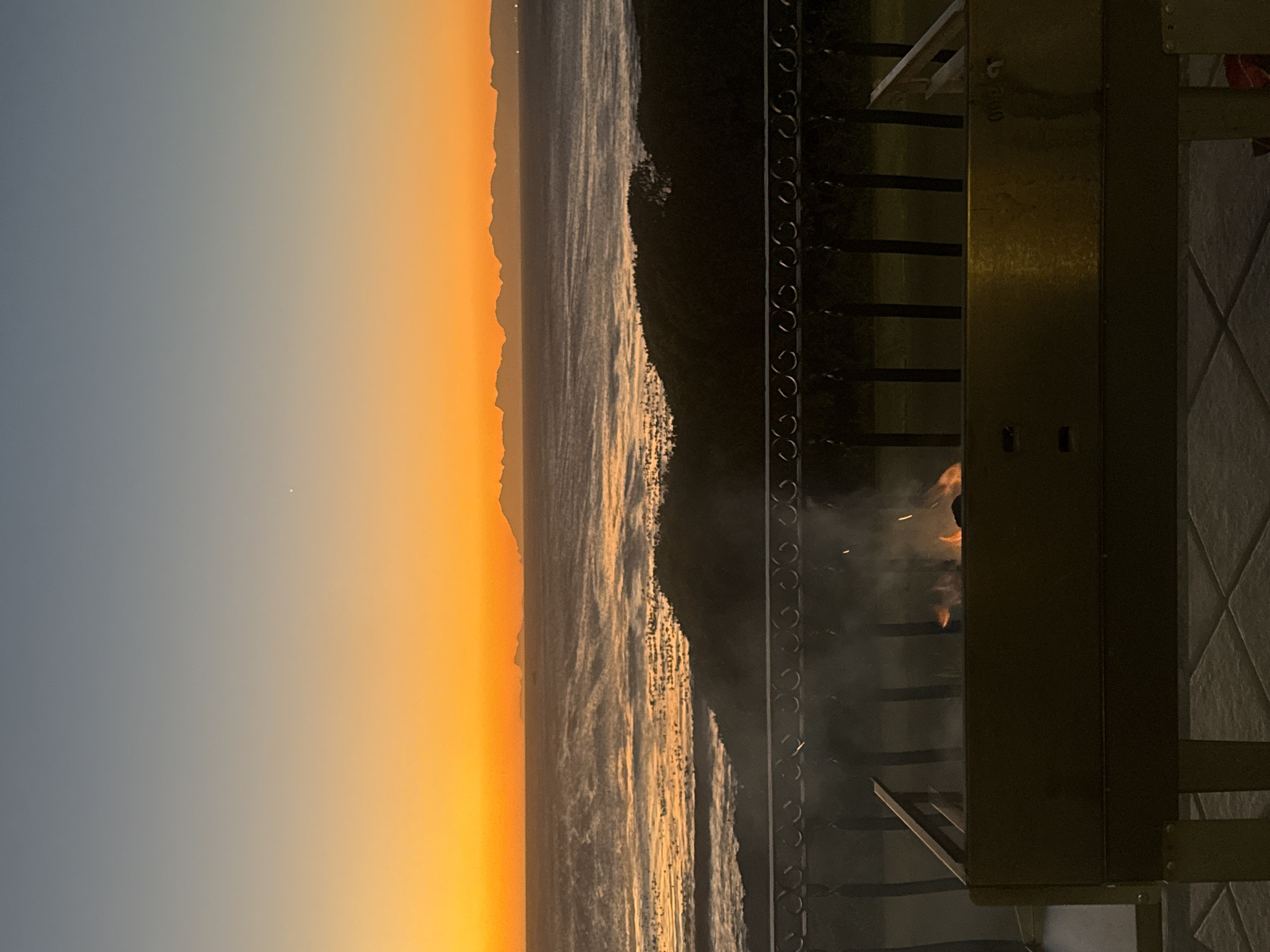 Sunset dinner preparation captured at Gans Bay coastal home