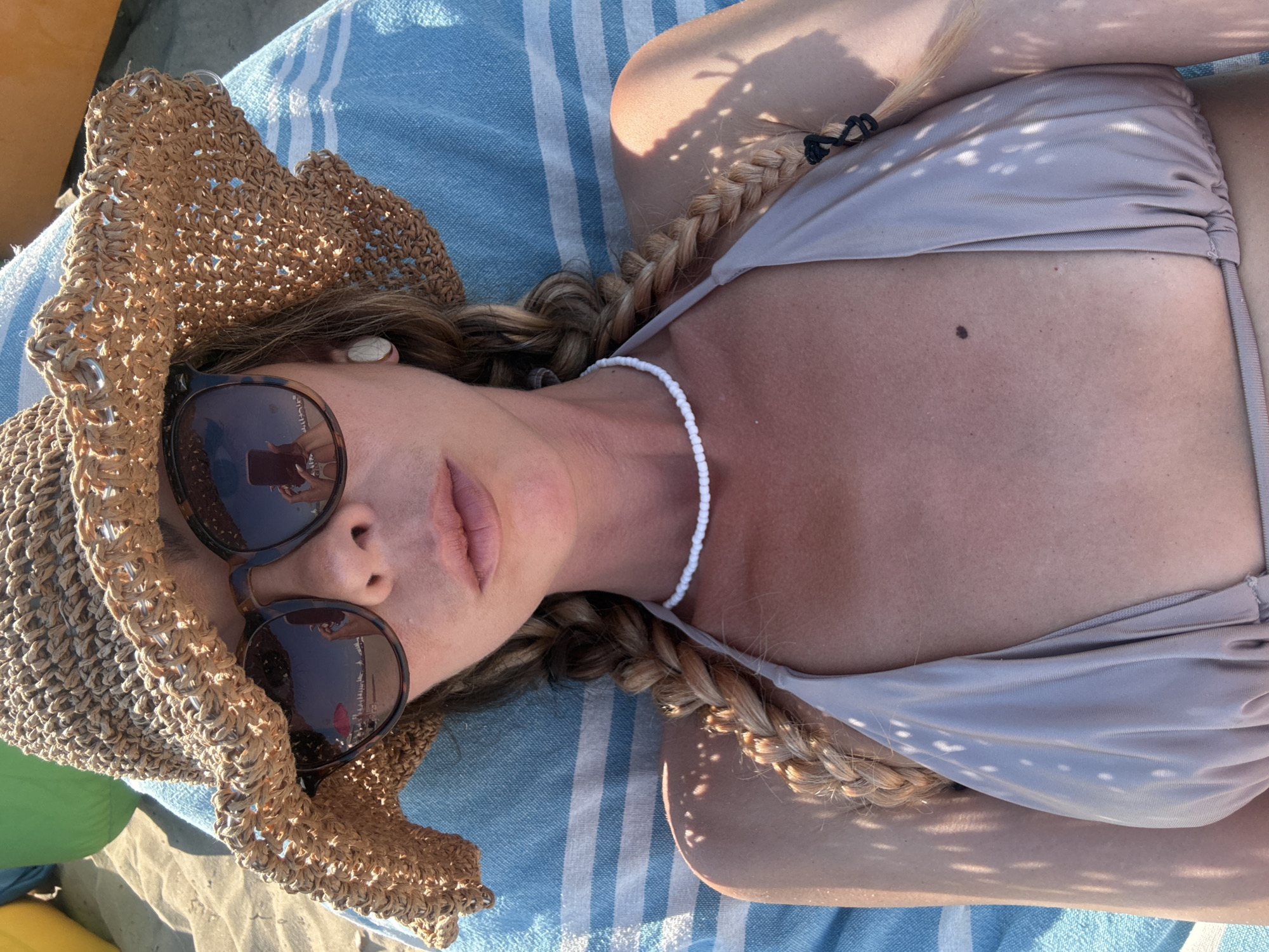 Relaxing on a sunny Nesebar beach, June afternoon