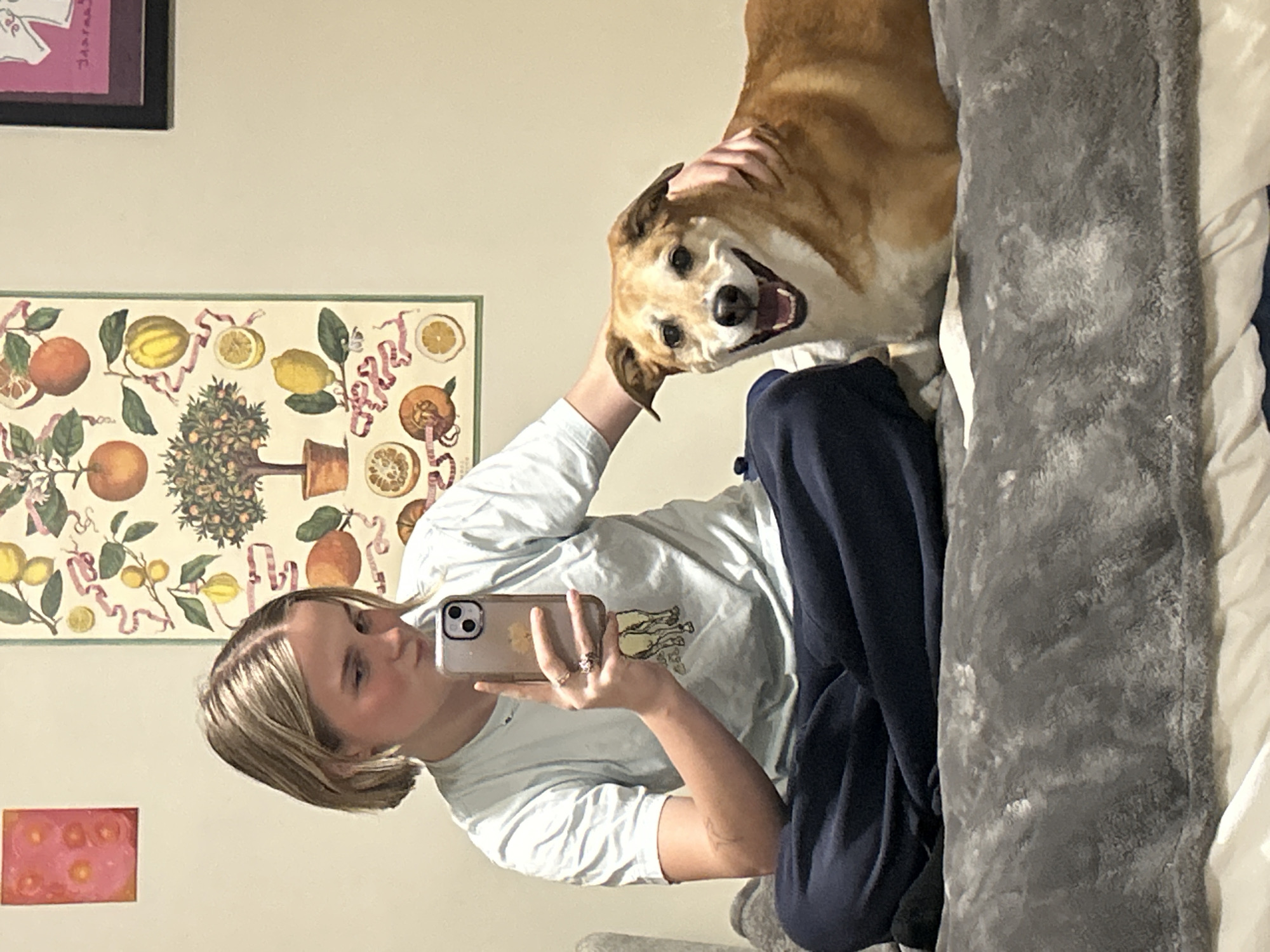 Person takes selfie with dog at home in Vancouver