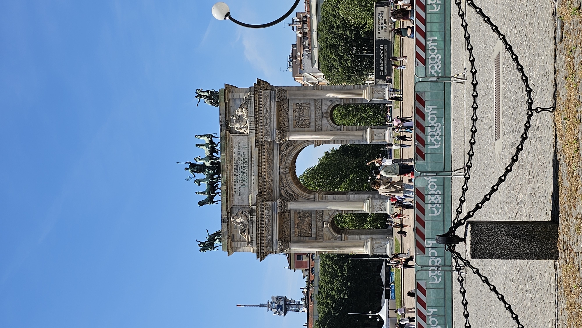 Weekend crowds gather at Milan's Arco della Pace and Sforza Castle