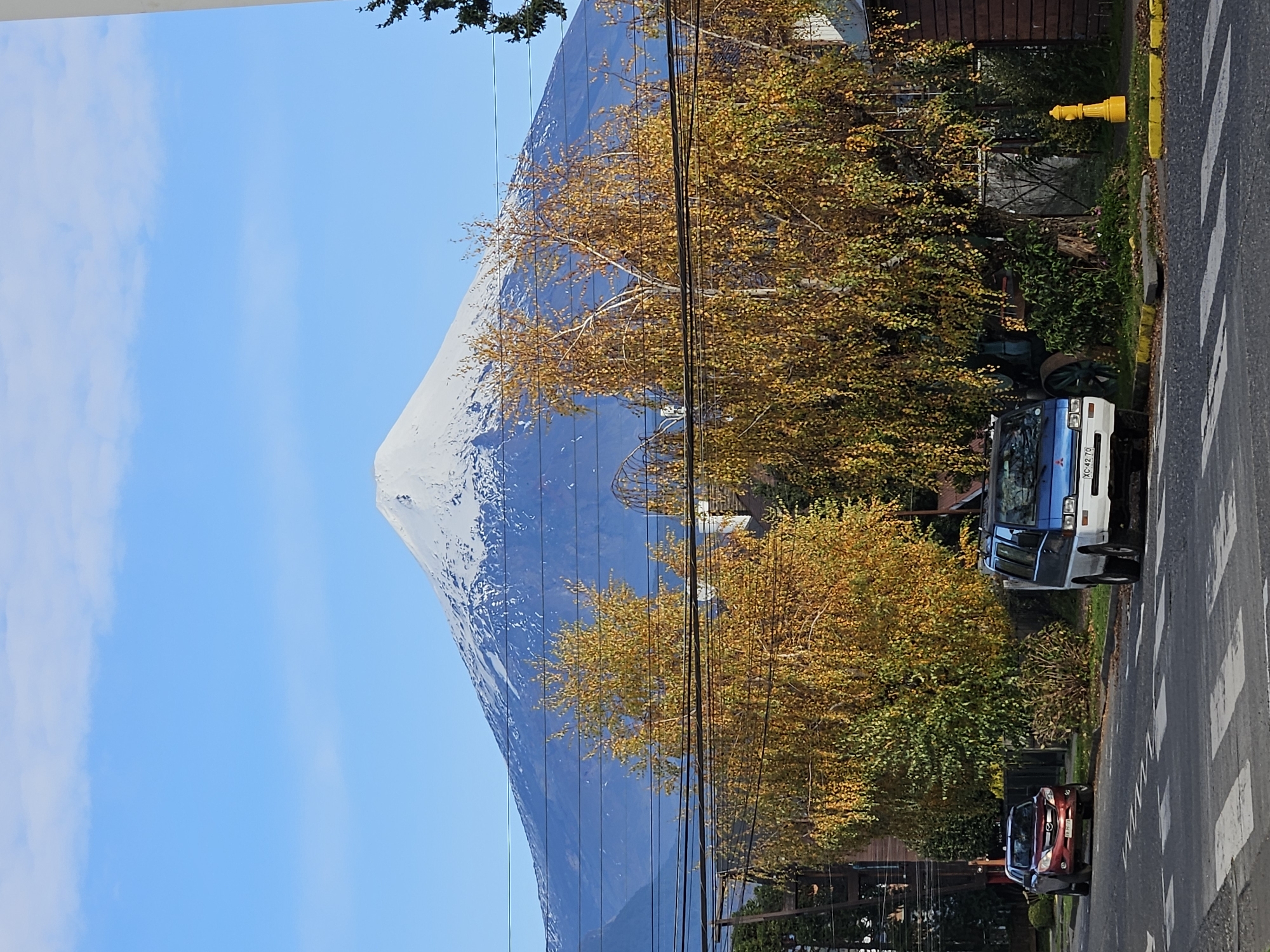 Pucón residents capture volcano and mountain reflections on bright day