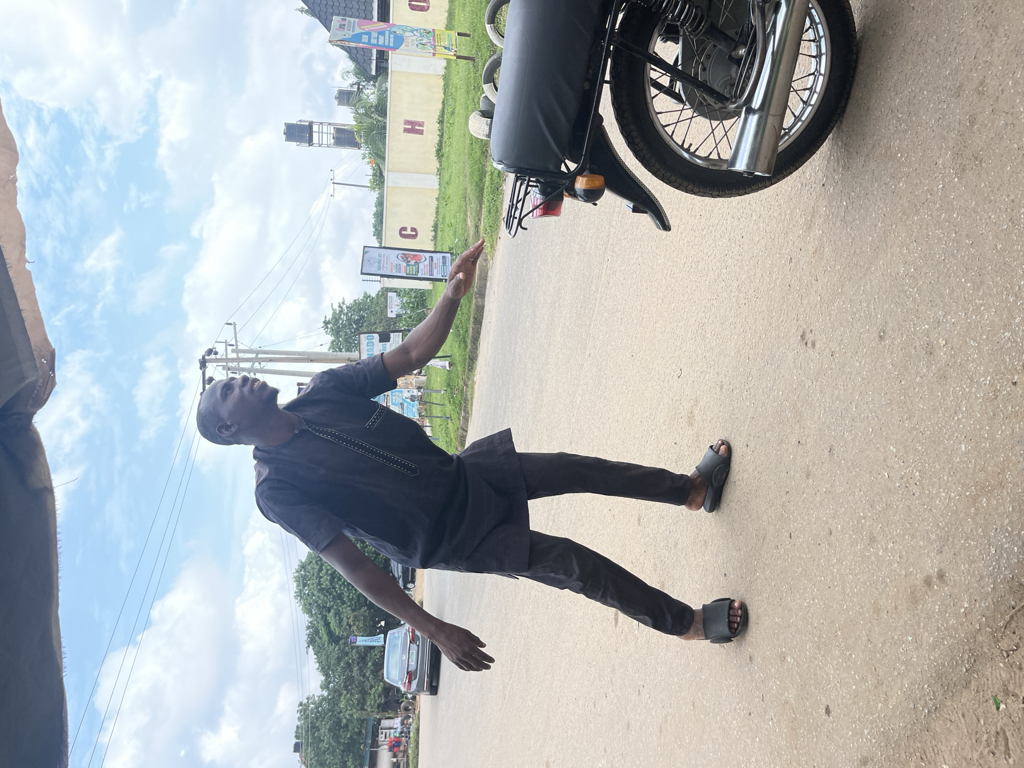 Everyday street life along a busy Abuja corridor