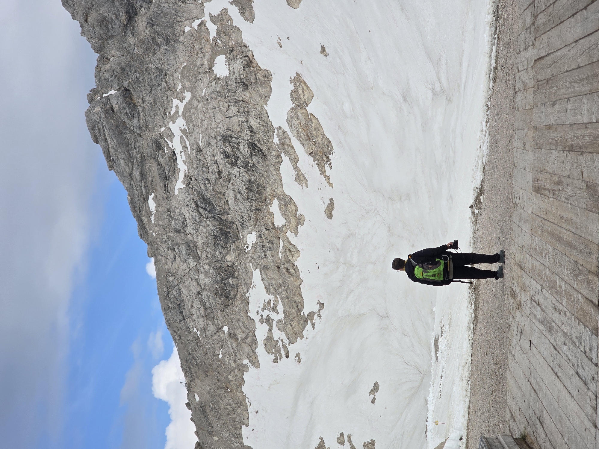 Snowy mountain viewpoint deck, Garmisch-Partenkirchen, June morning