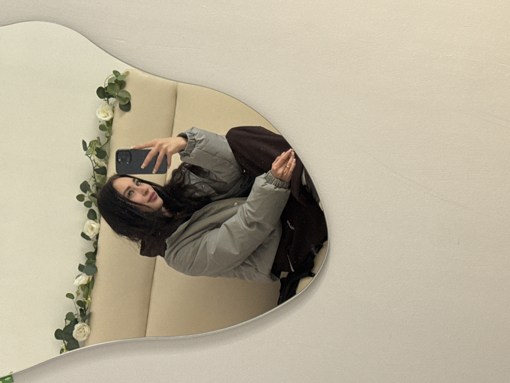 Woman takes mirror selfie in Foki, Russia