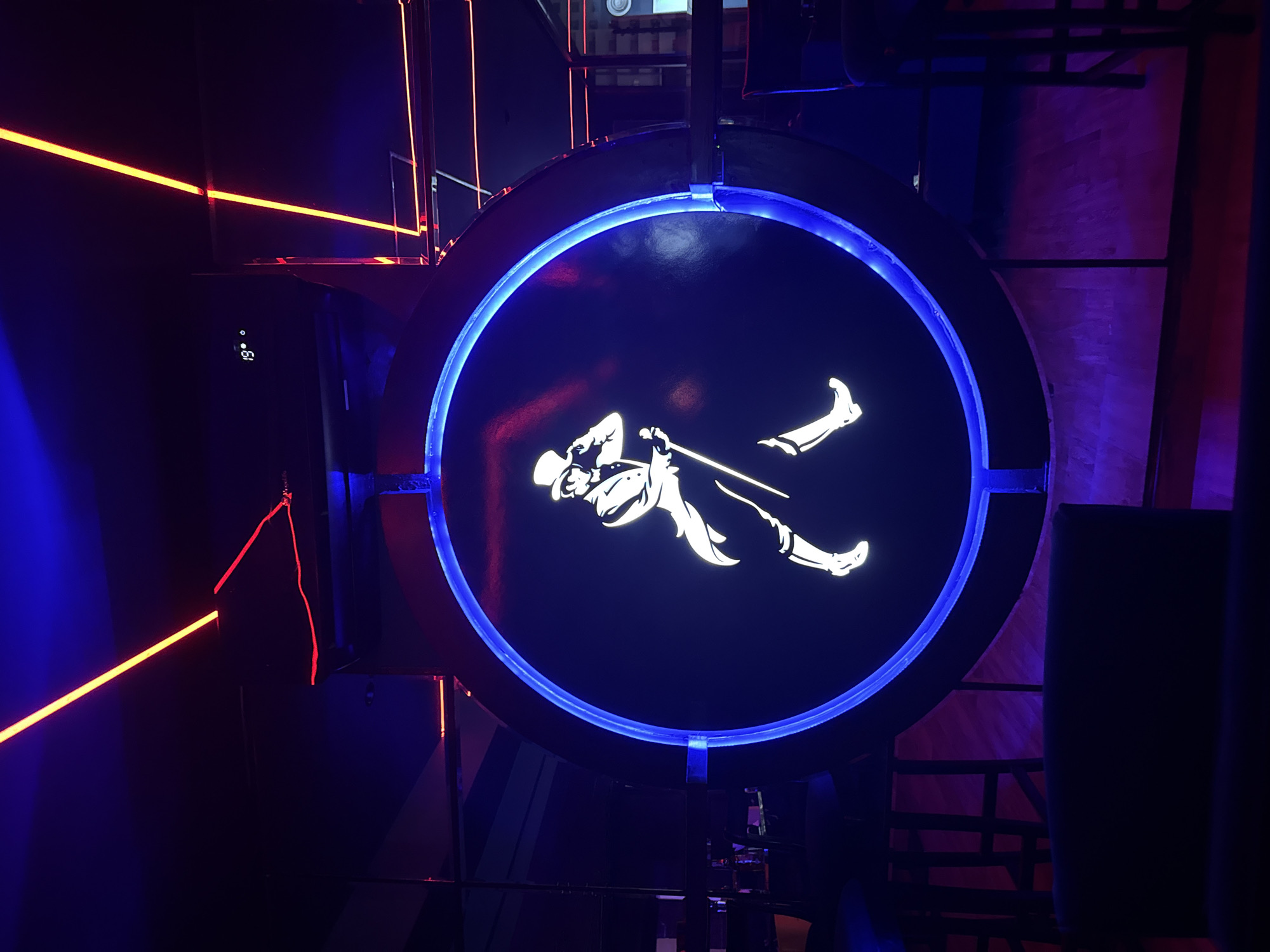 Nightclub scene and neon signage captured in Tangier