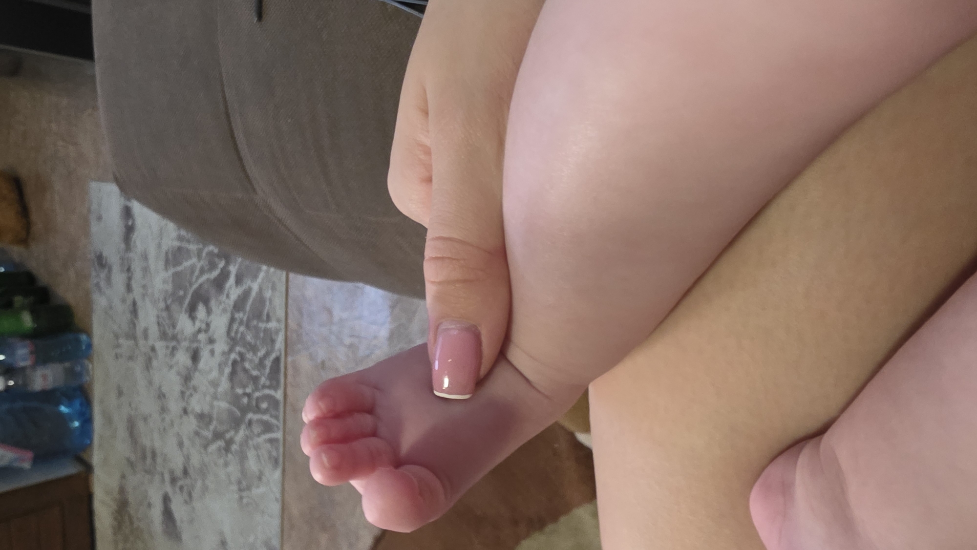 Baby care and pet moments captured in Bulgarian home