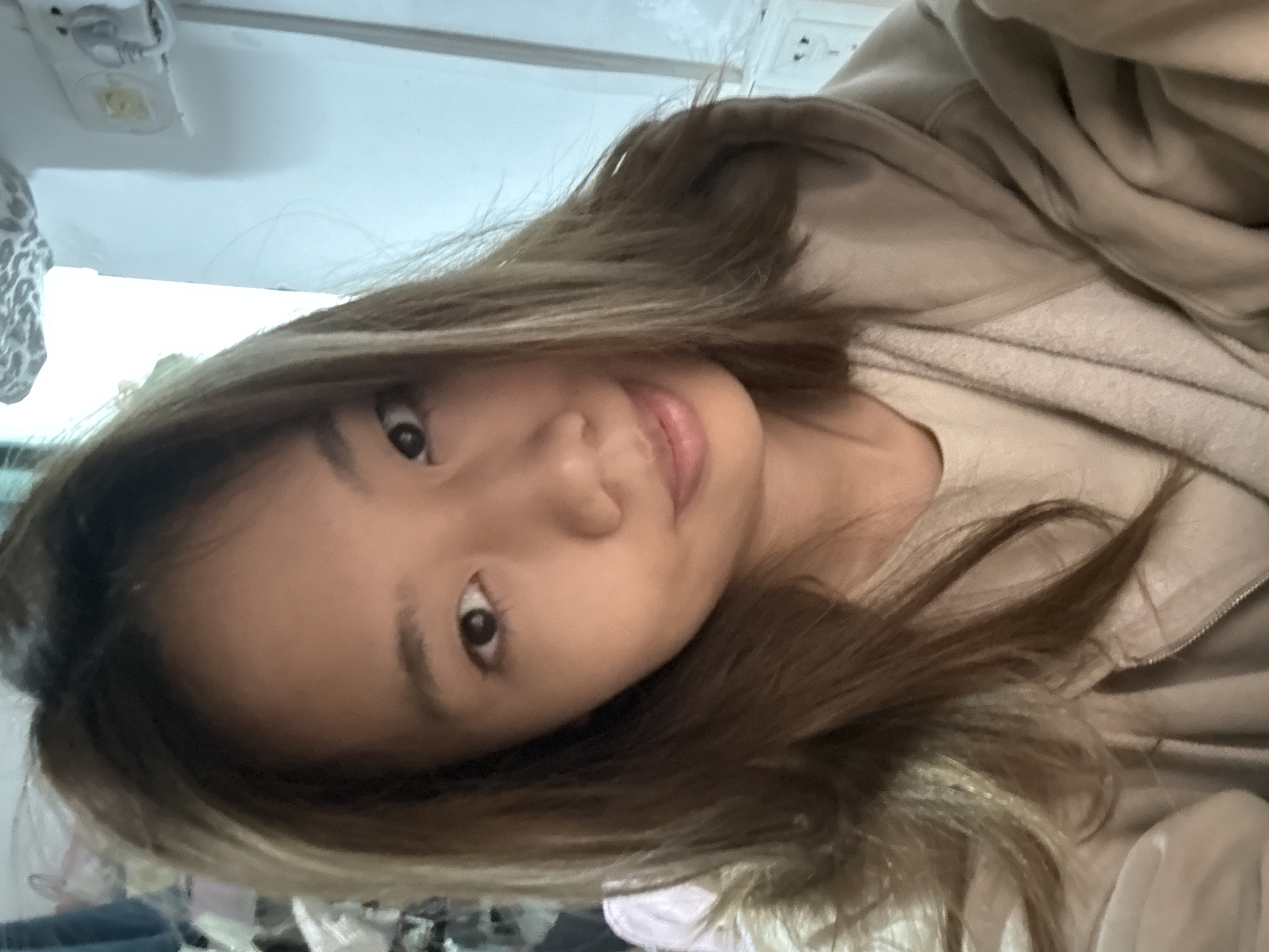Woman takes indoor selfies in Nan'an District, China