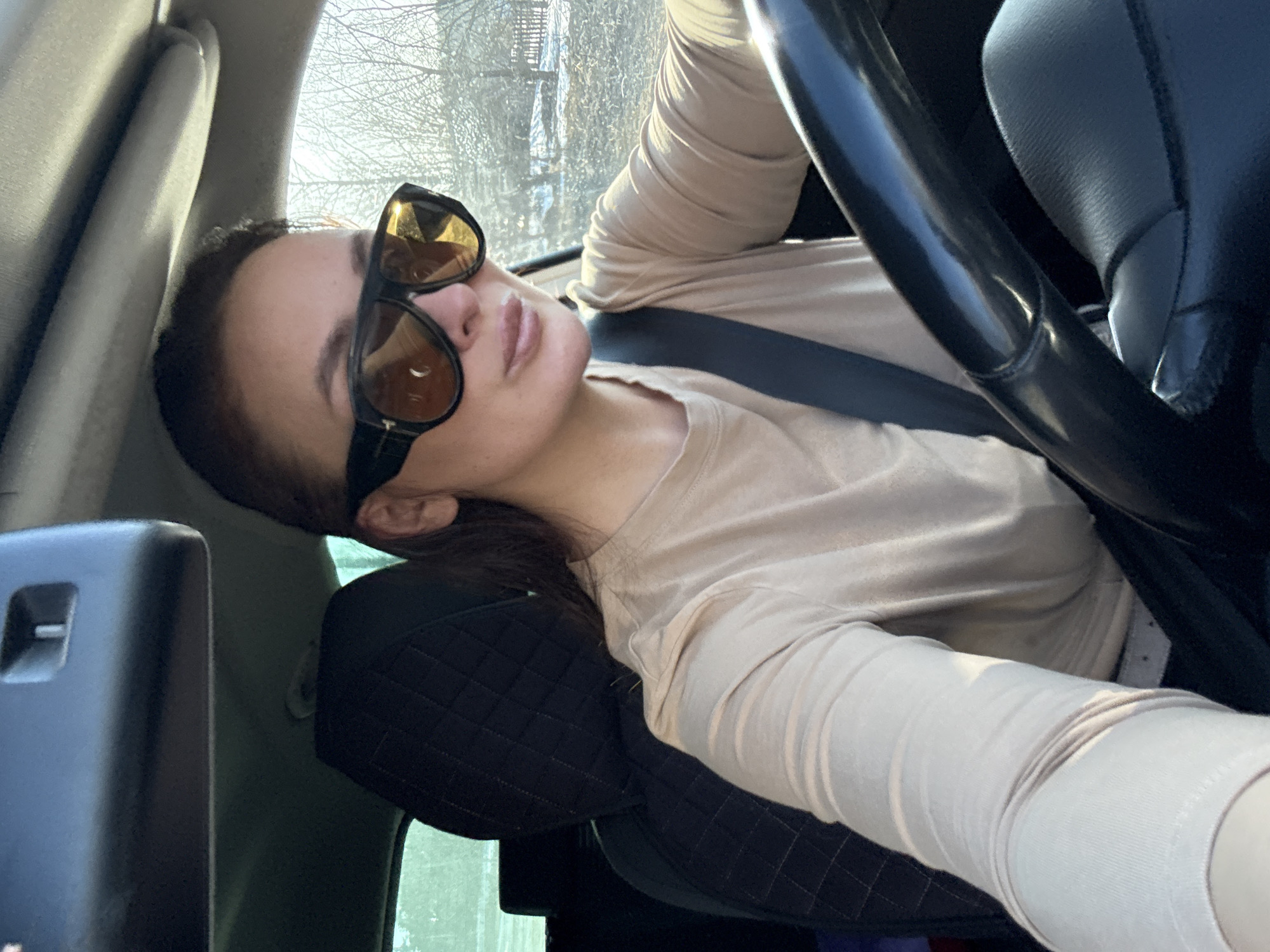Woman sits in driver's seat in Chaikovsky, Russia