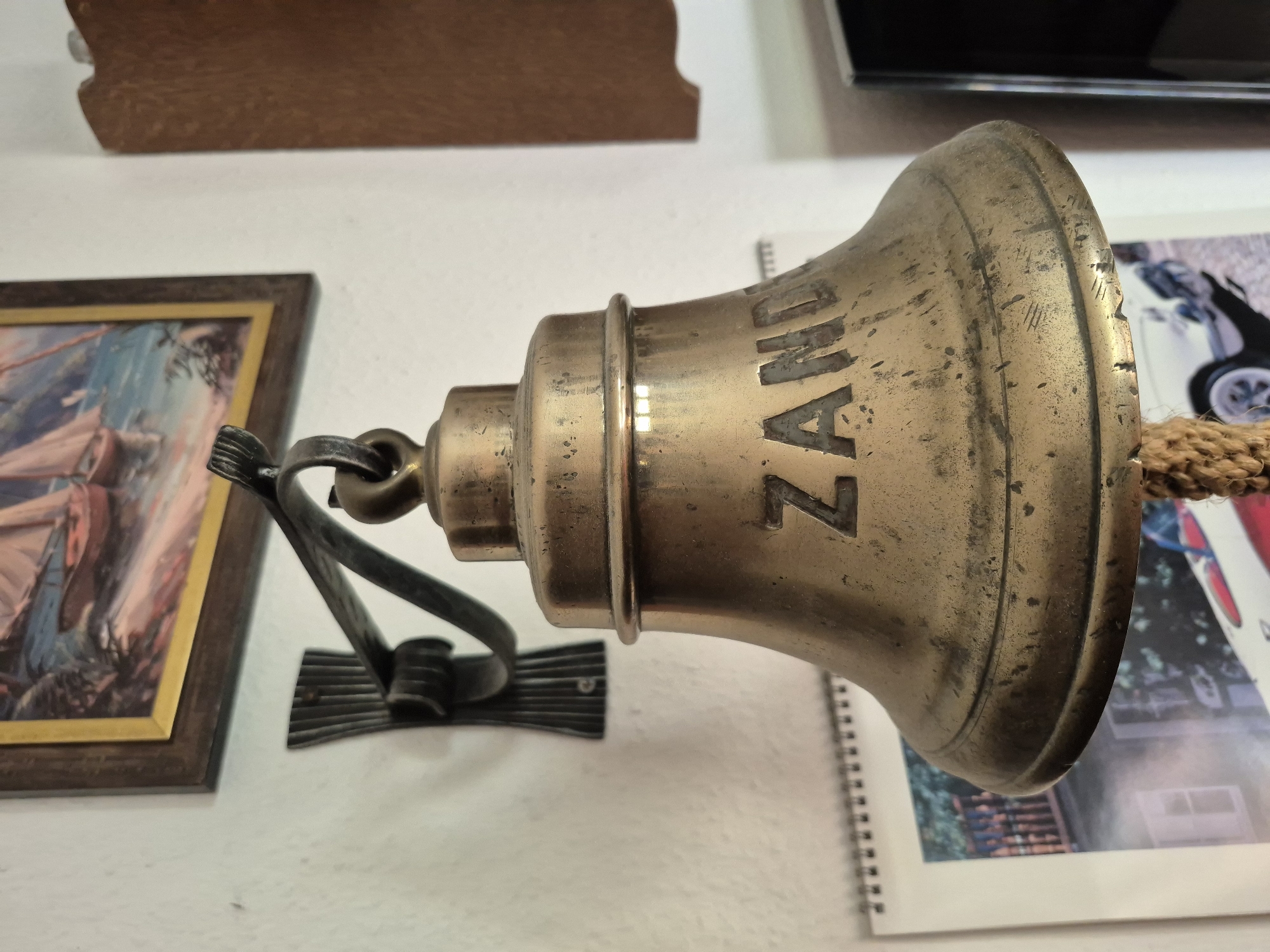 Nautical collectibles and curiosities fill a Trier interior