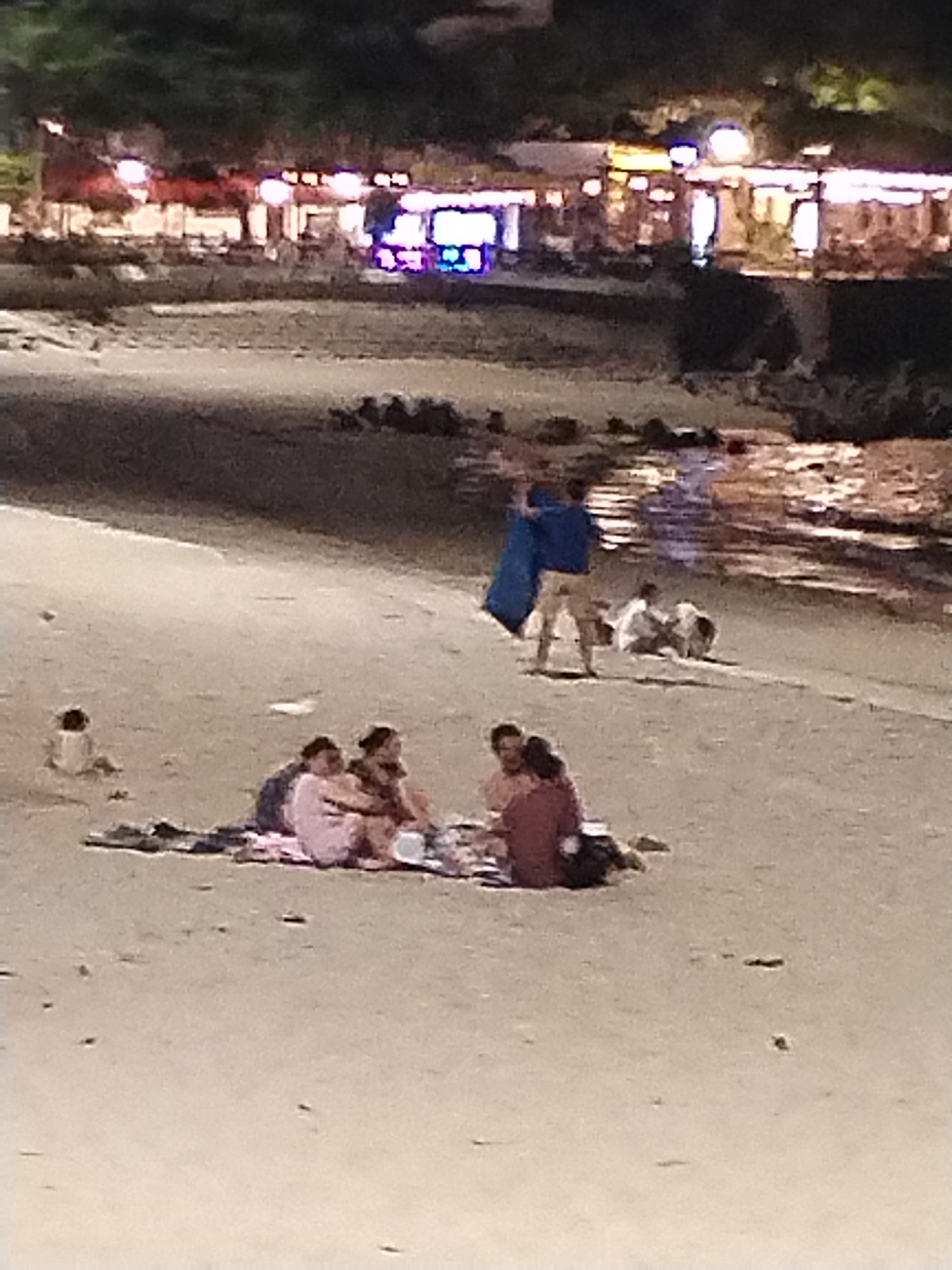 Nighttime beach gathering draws multiple groups in Nha Trang
