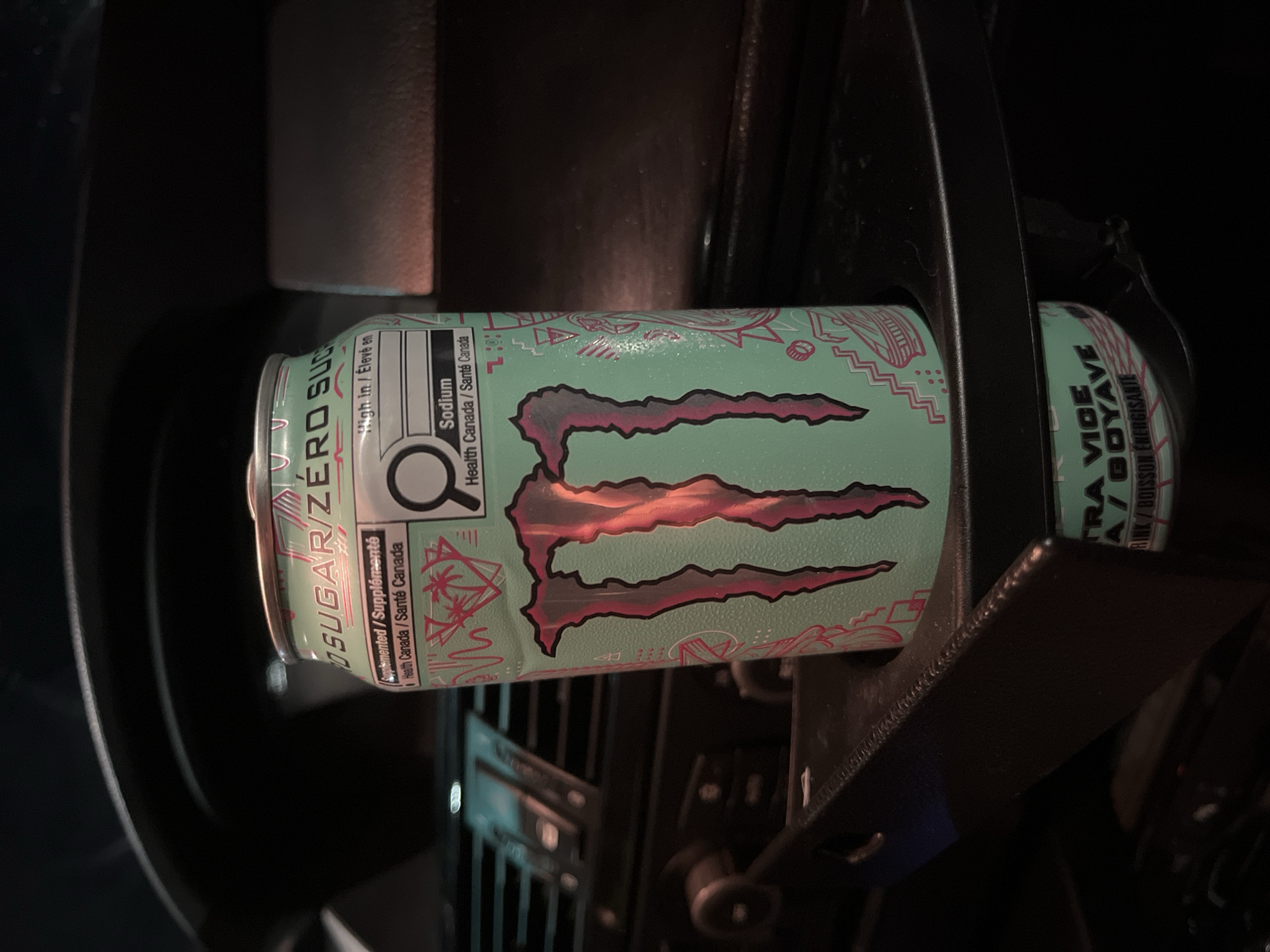 Monster Energy drinks photographed in car cup holders, Shumen