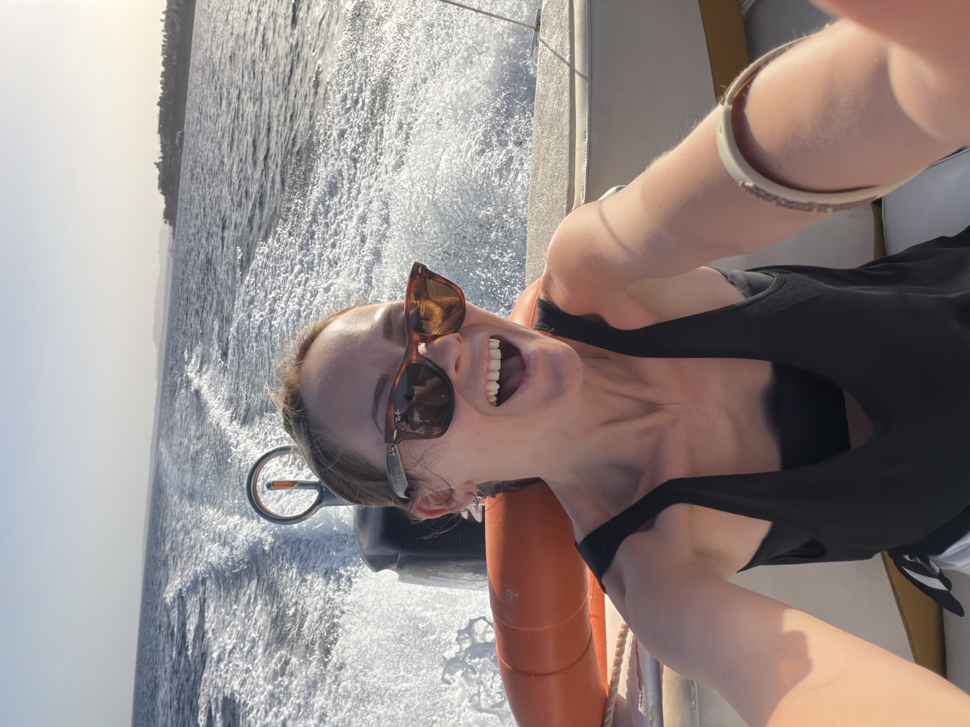 Woman takes selfie on boat in Sharm El Sheikh