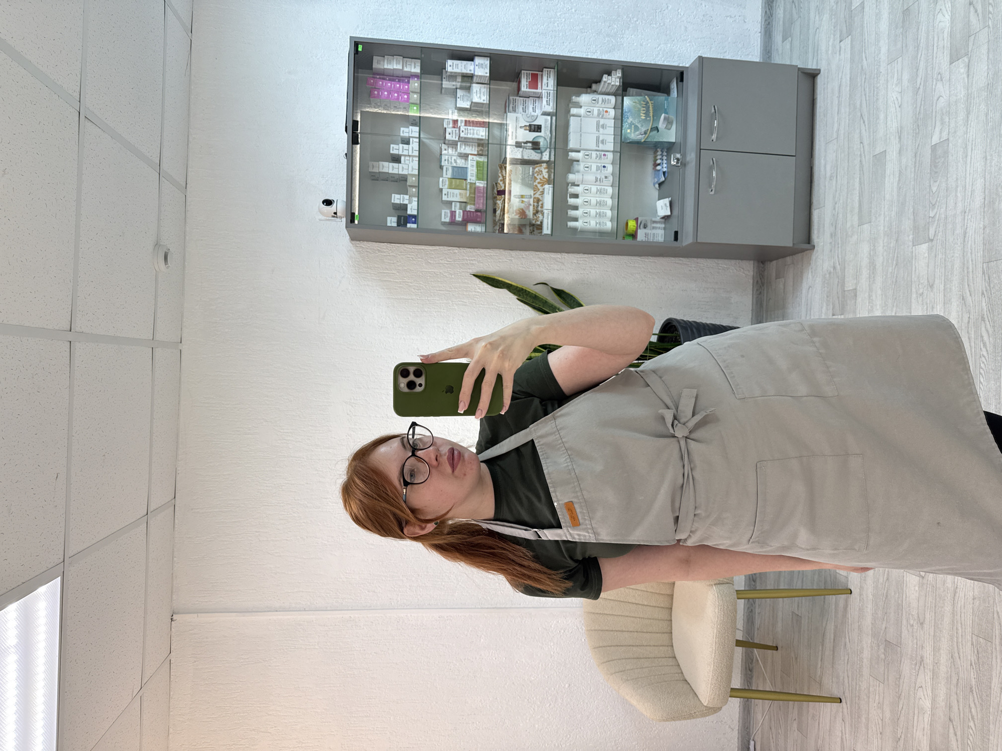 Two women take selfies in modern Chaikovsky interior