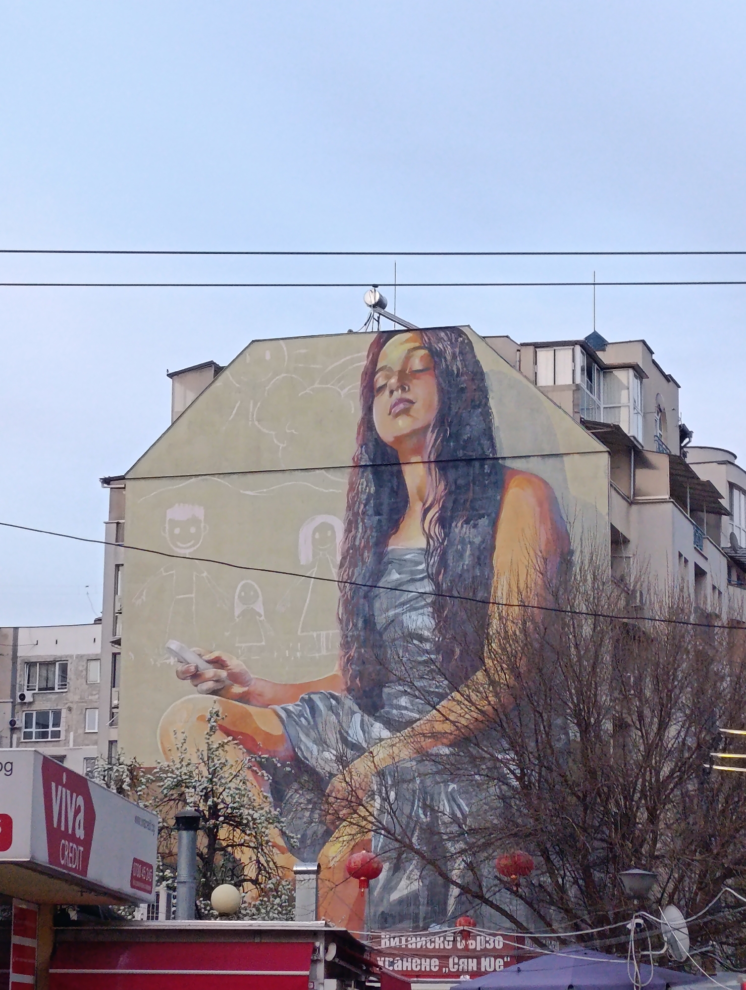Mural of woman with chalk spotted on Sofia building