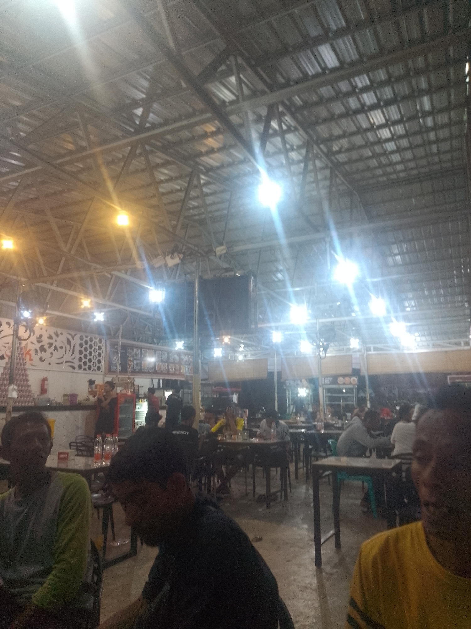 Evening at an open-air restaurant in Lhokseumawe, Indonesia