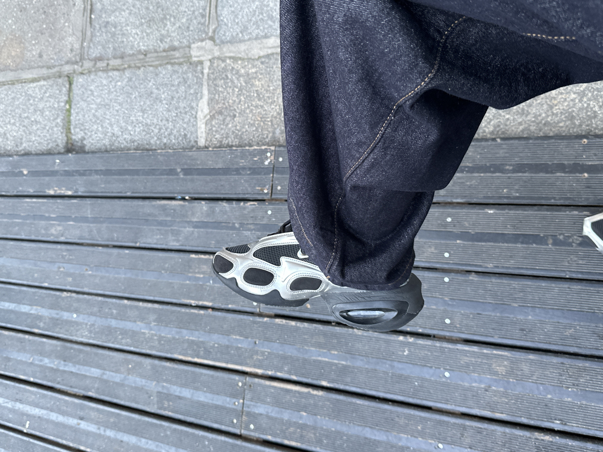 Parisians captured in routine street moments across central city