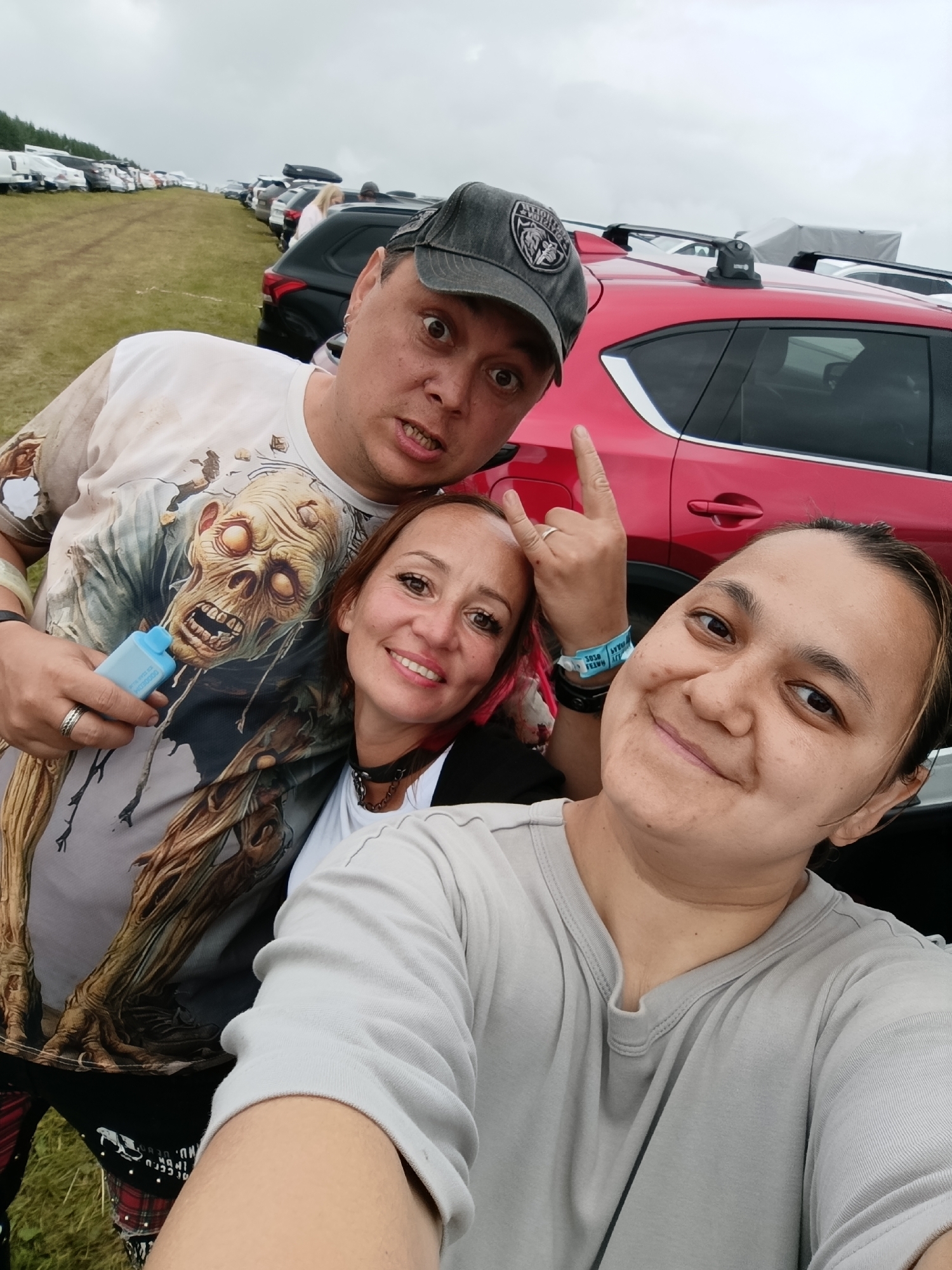 Muddy outdoor event in Lagunovo draws crowds and heavy machinery
