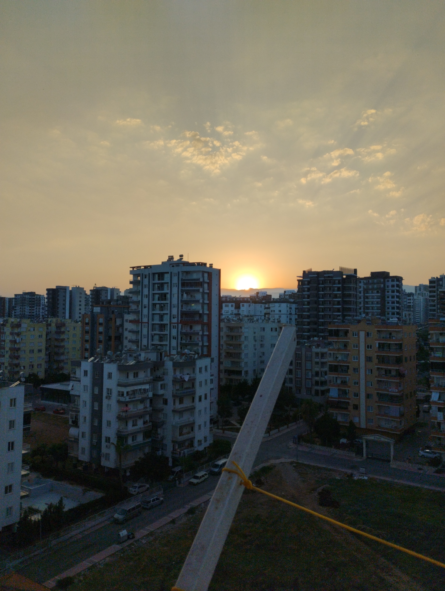 Balcony views across Mezitli at sunset, July evening