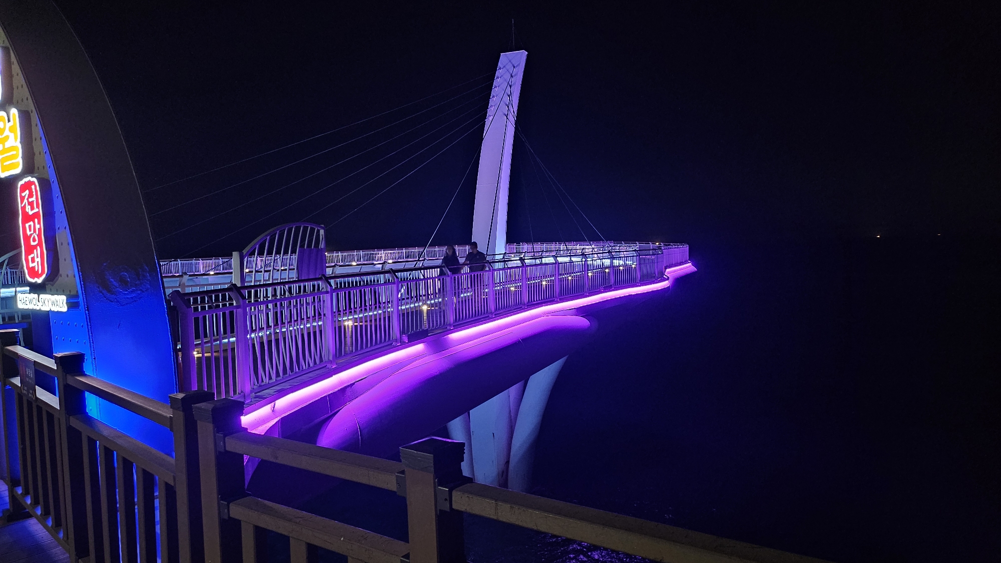 Busan's illuminated bridges and skywalks captured at night