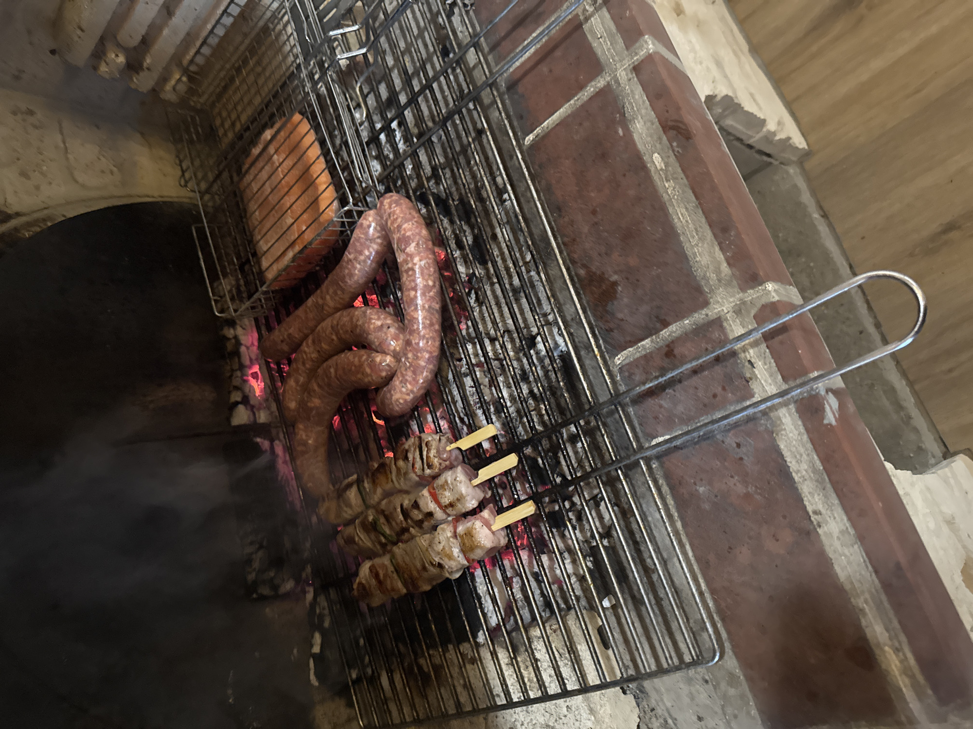 Cozy evening with poodle, fireplace, and outdoor grilling in Bulgaria