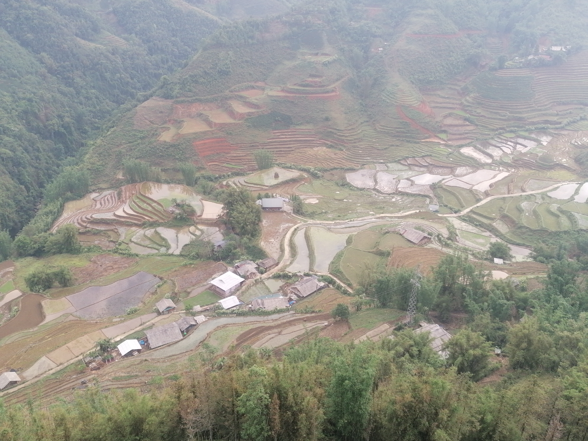 Aerial views capture Sa Pa's terraced landscapes and misty mountains