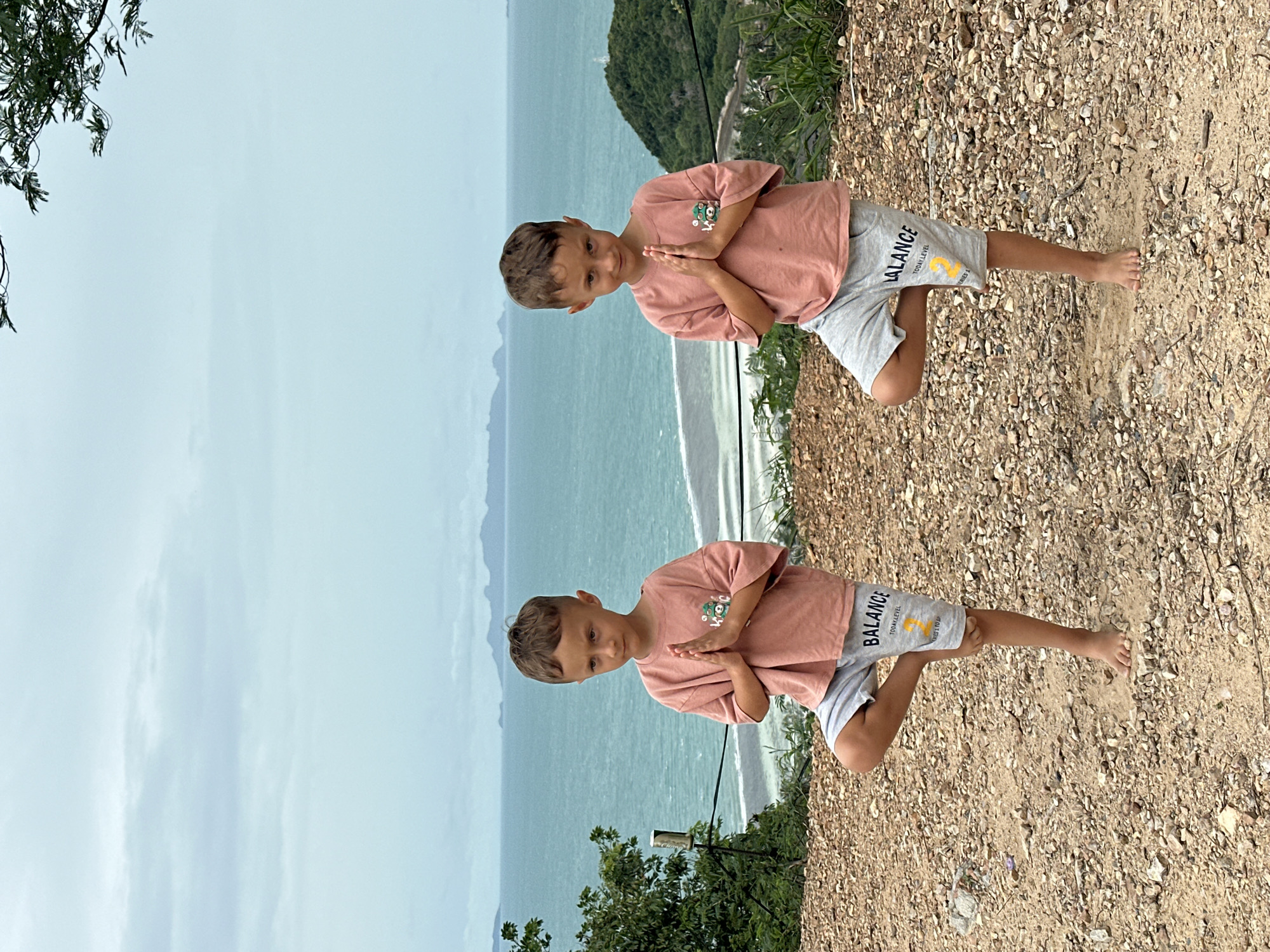 Yoga poses and coastal views on a cloudy Ko Samui morning
