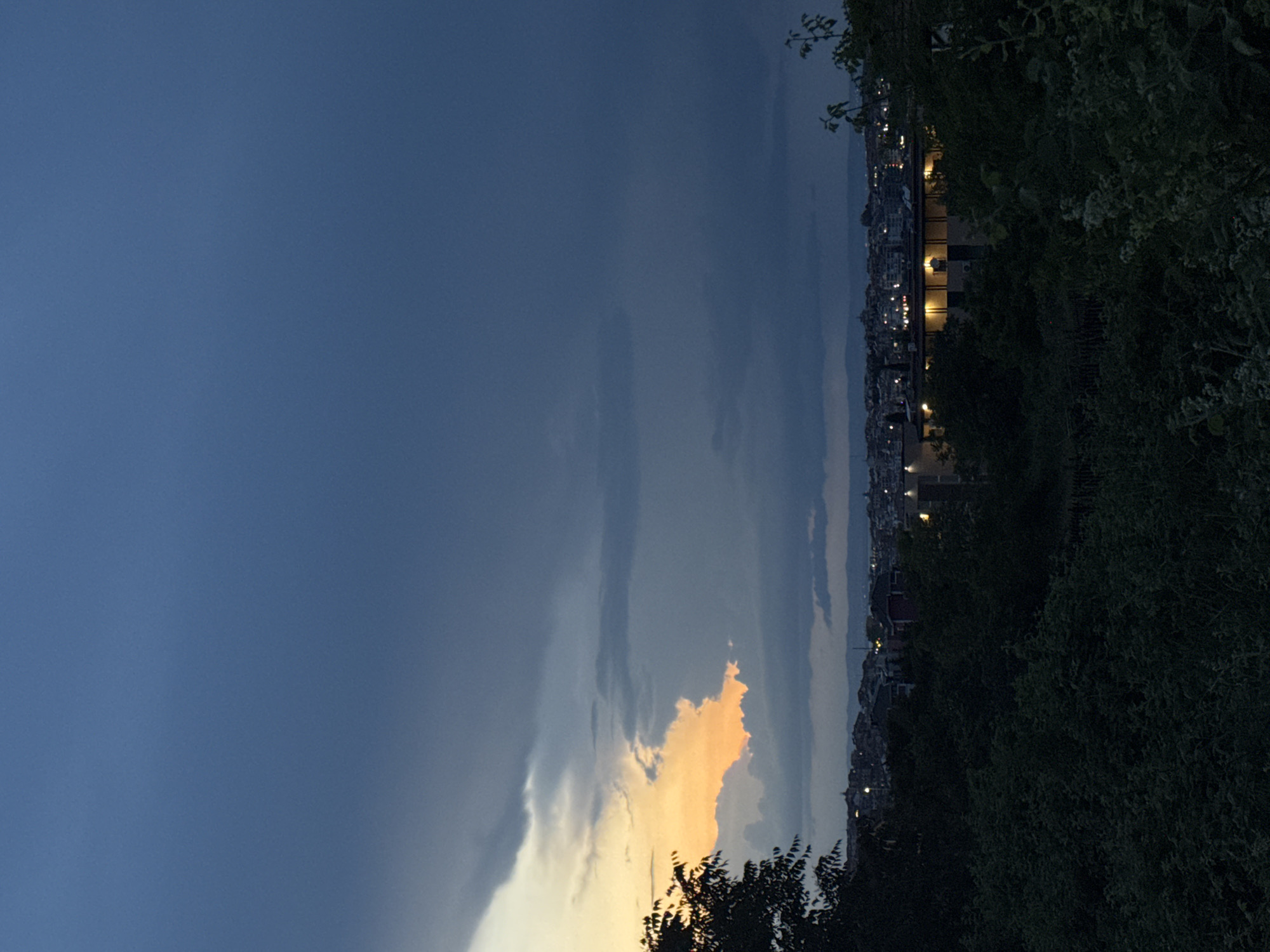 Golden clouds capture twilight moment over Sozopol, Bulgaria