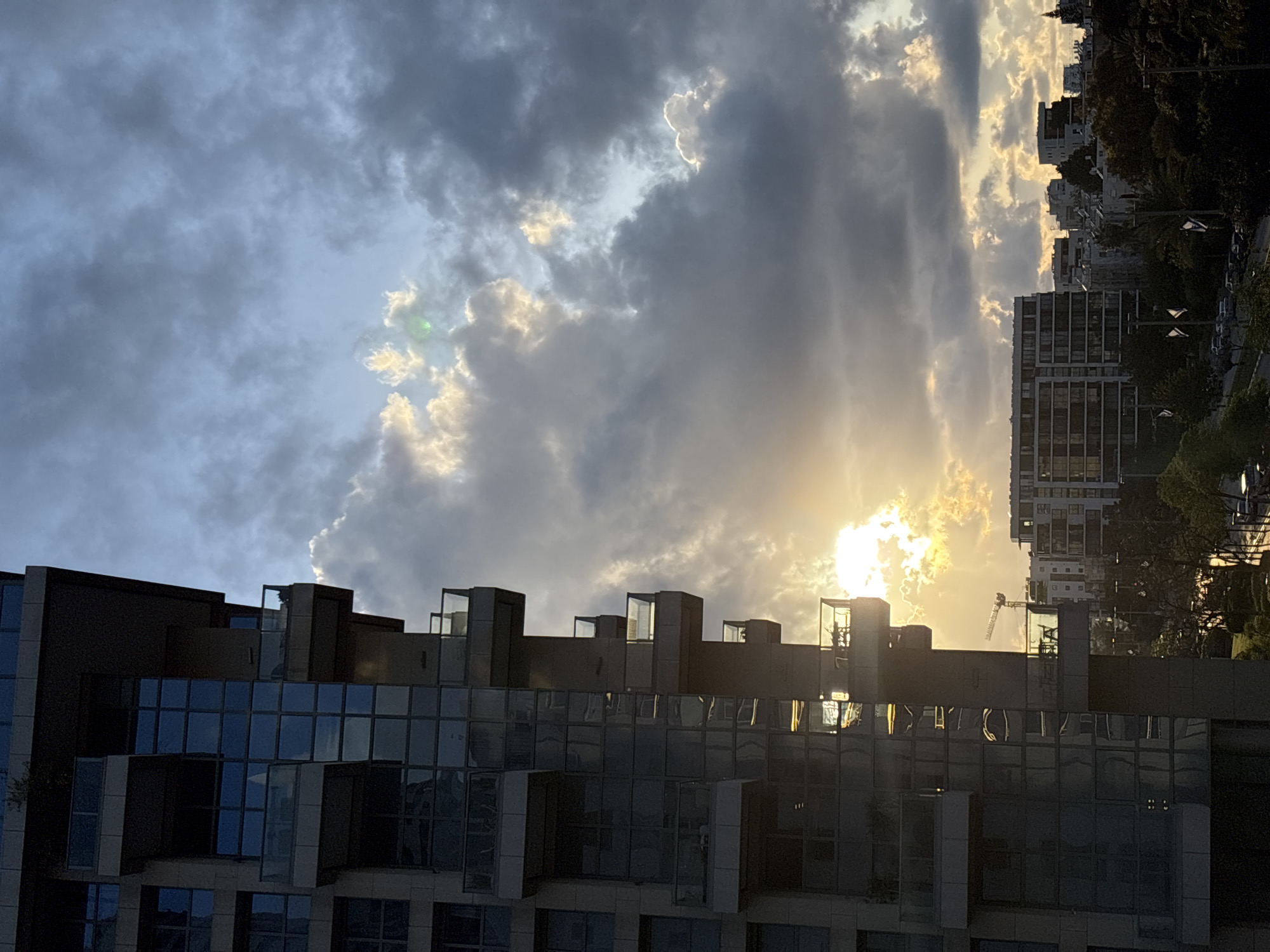 Modern building photographed against Tel Aviv skyline backdrop