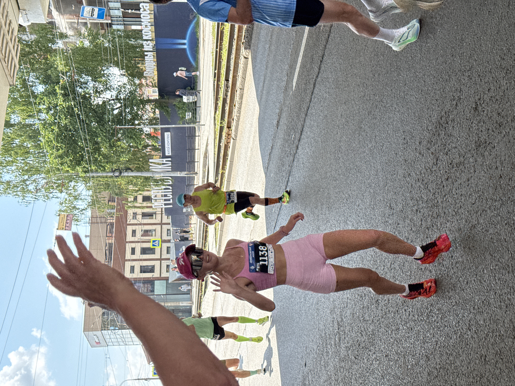 Marathon race through central Izhevsk streets on sunny morning