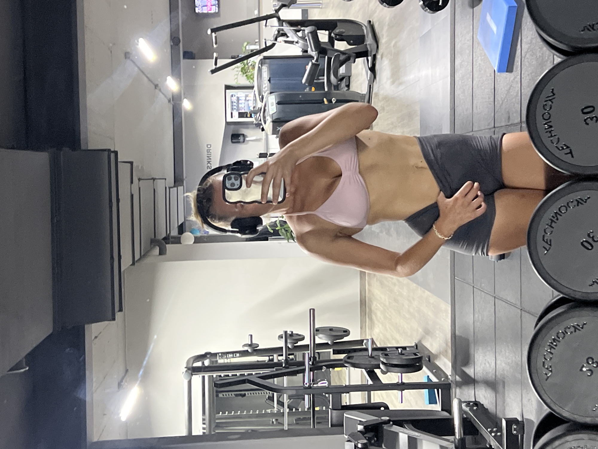 Gym mirror selfies in Mühldorf, same look, multiple takes