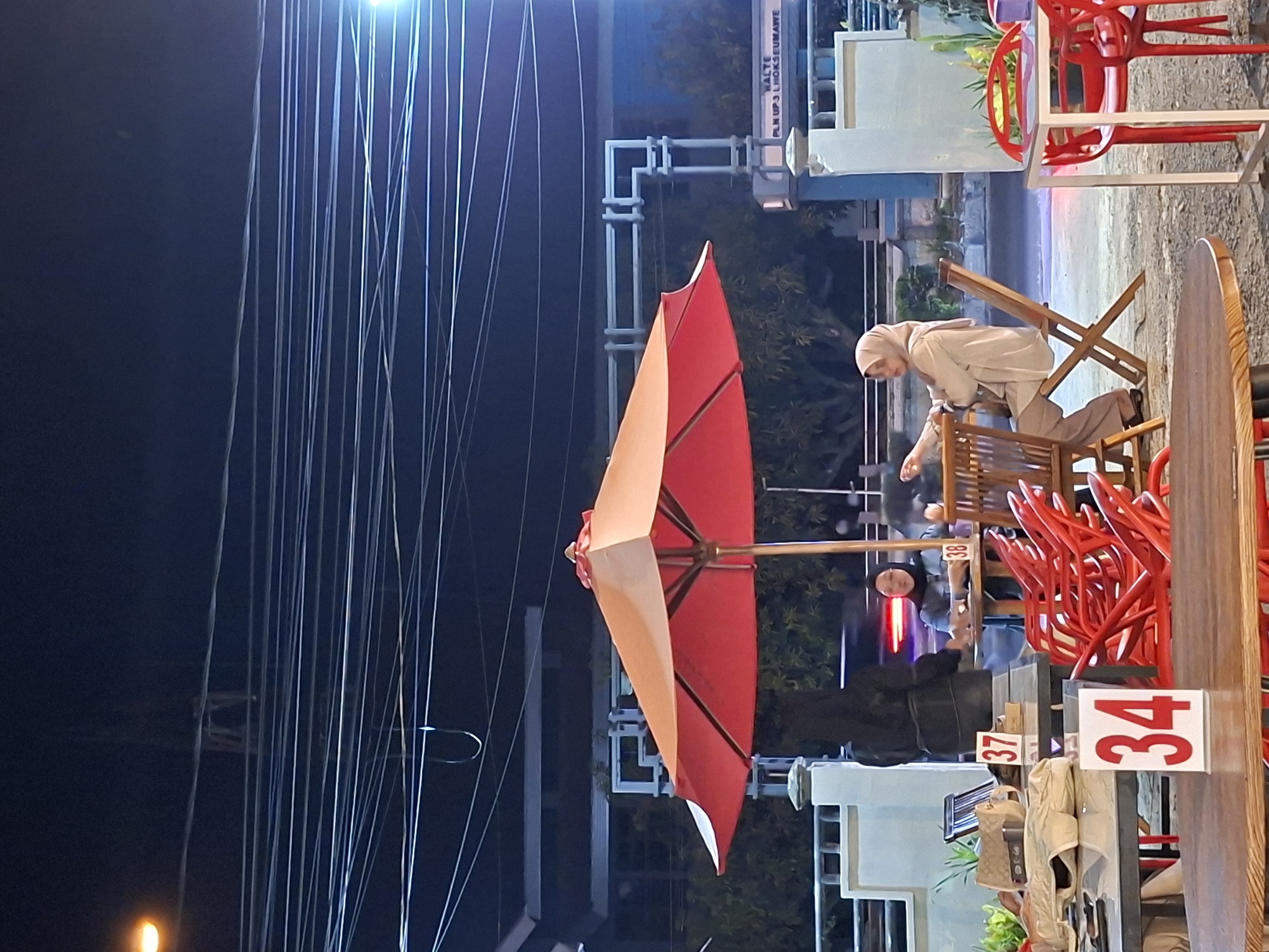 Live band performs at outdoor café in Lhokseumawe