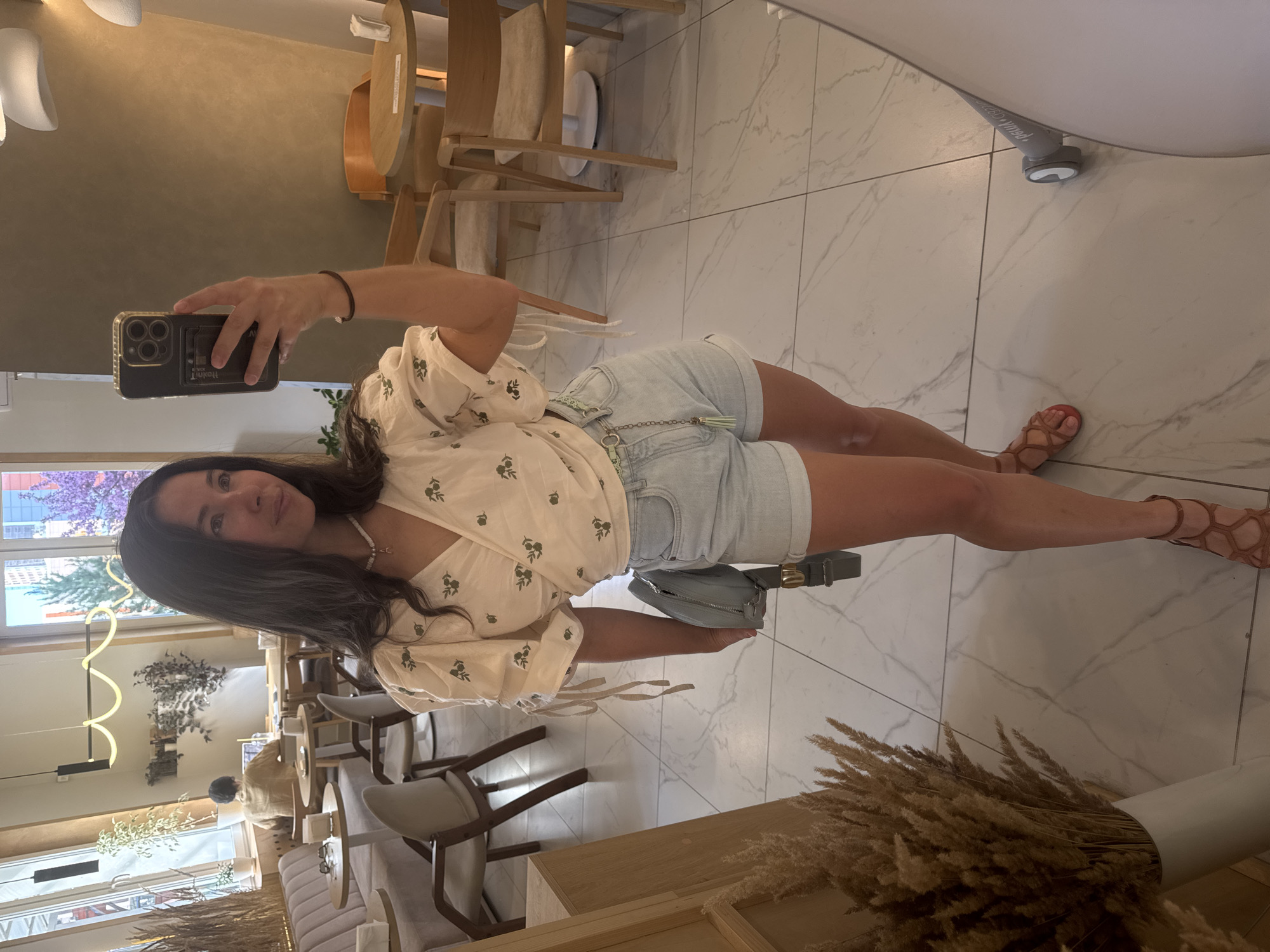 Woman takes selfie at Kazan cafe