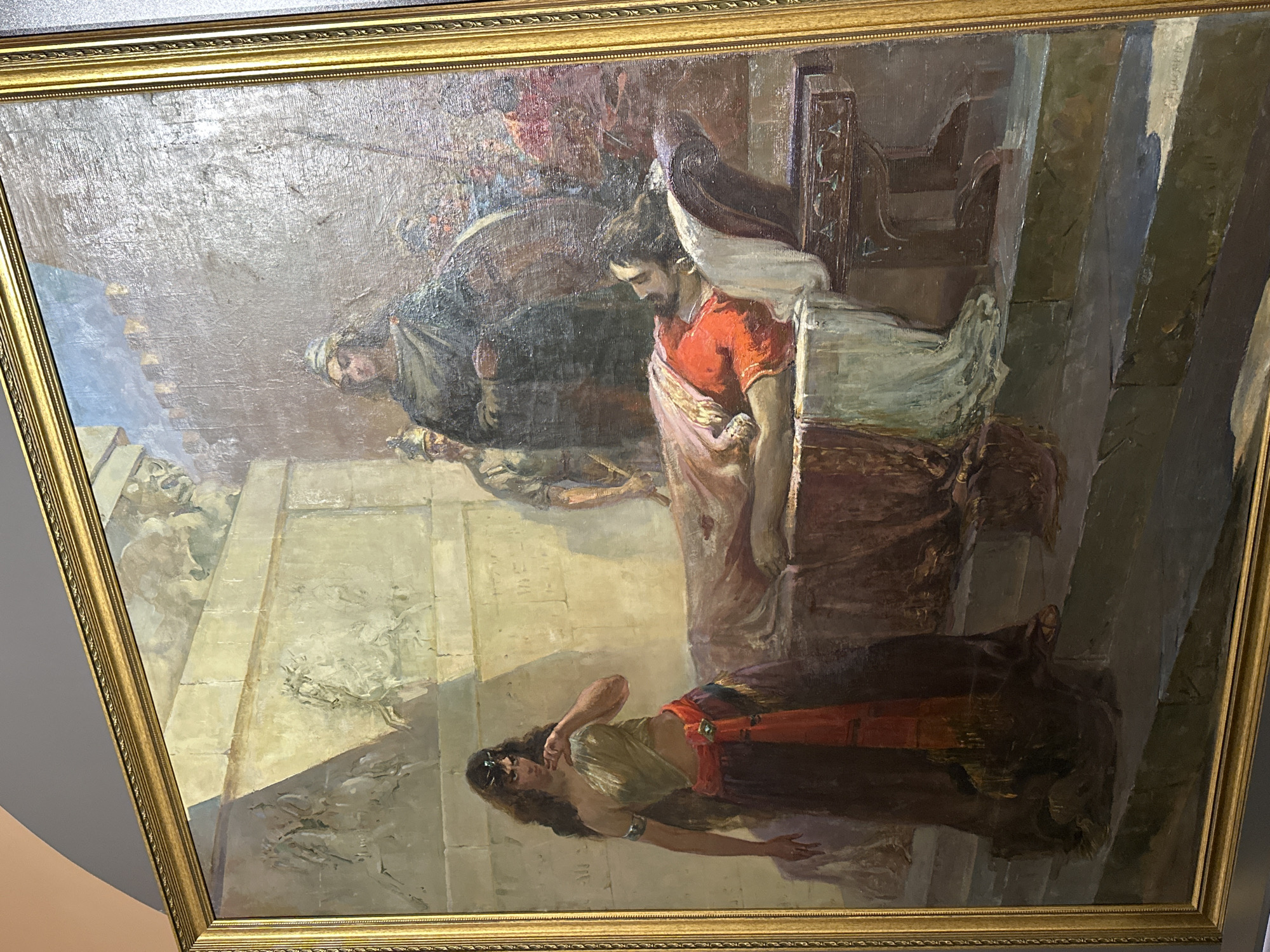 Visitor documents cultural artifacts at Yerevan museum exhibition