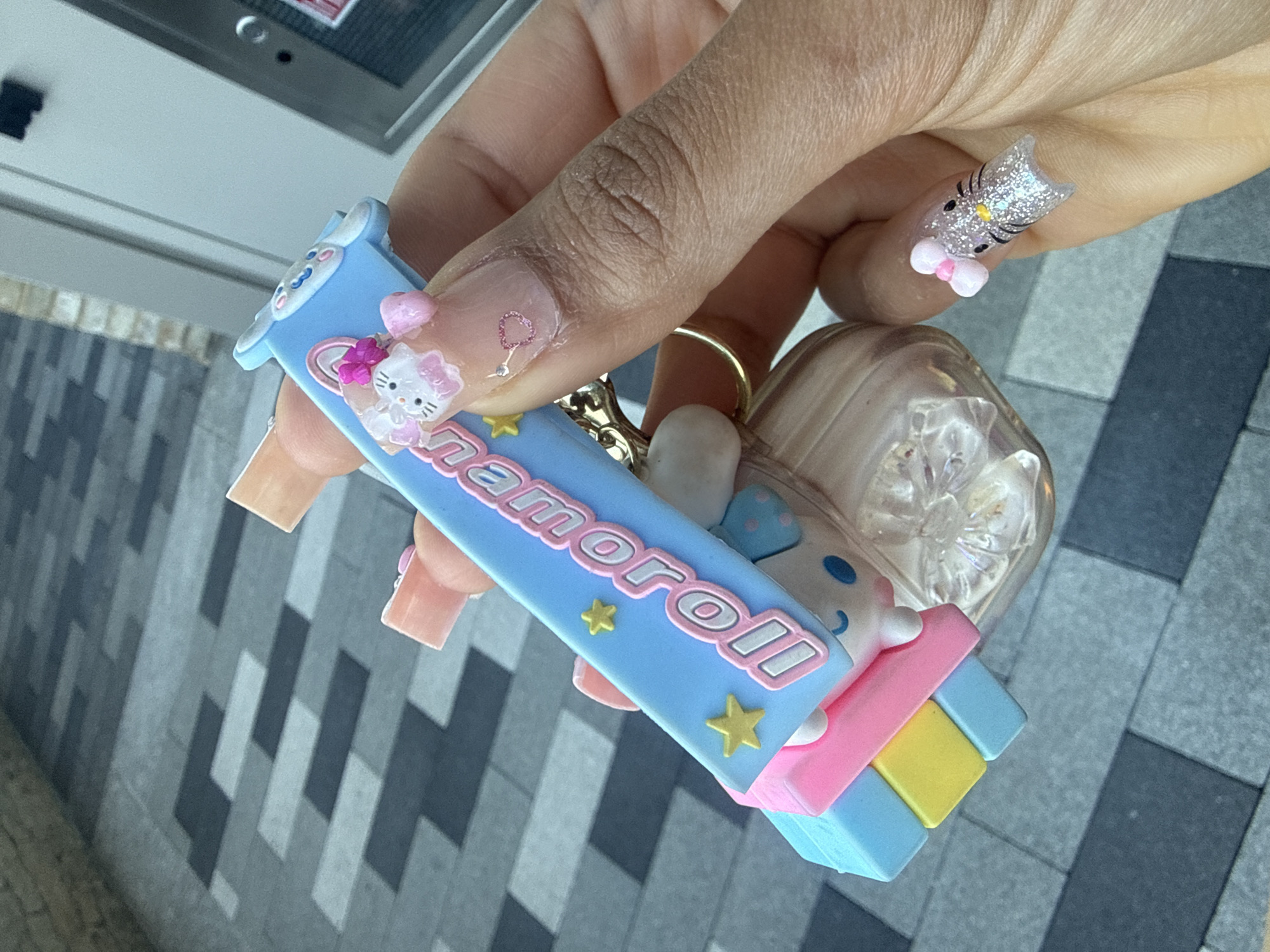 London resident displays Cinnamoroll keychain with decorated nails