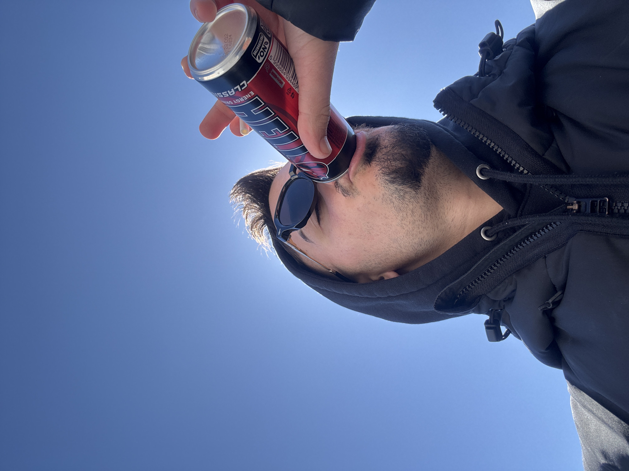 Man in black jacket spotted on Sofia rooftop overlooking city
