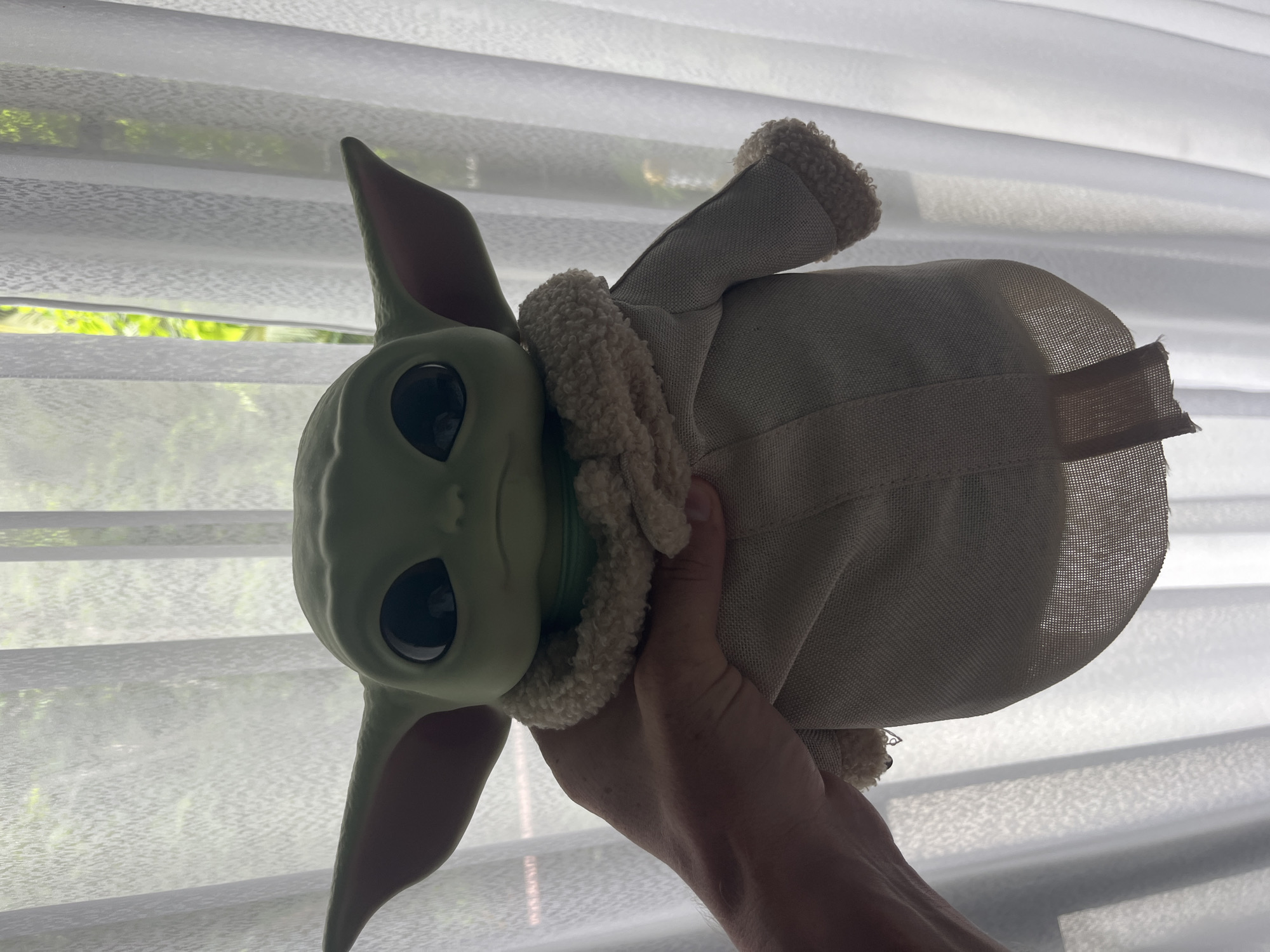 Grogu plush toy documented in morning car journey, Rawai Thailand