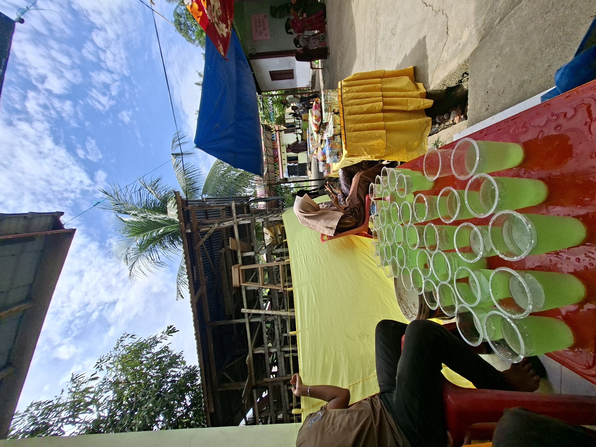 Community gathering near a mosque in Kruengmate, Indonesia