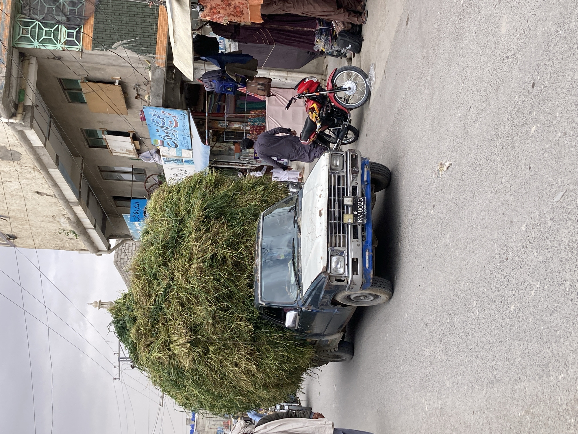 Overloaded hay truck spotted on Quetta street