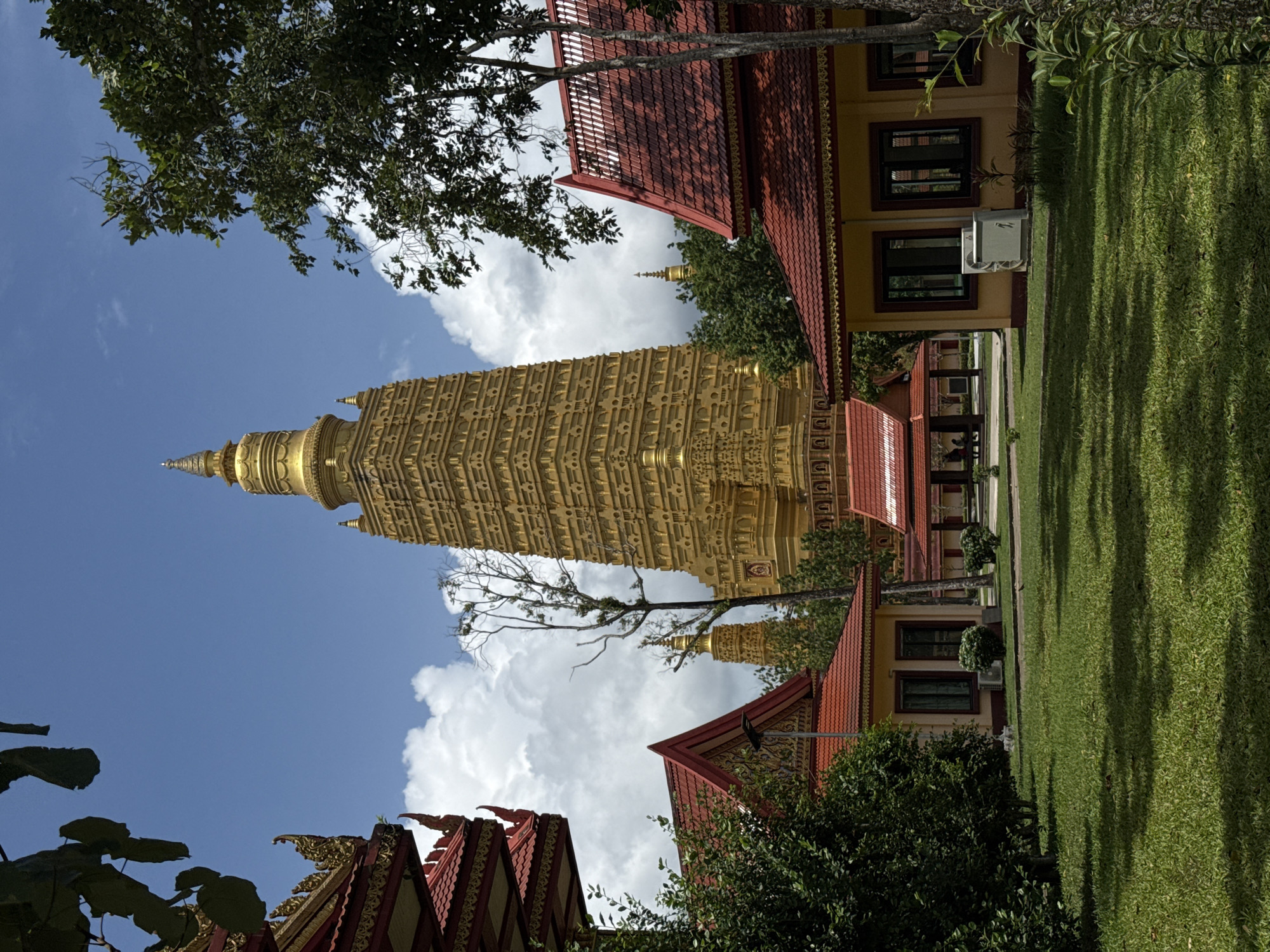 Inside and outside a ornate Buddhist temple in Na Nuea