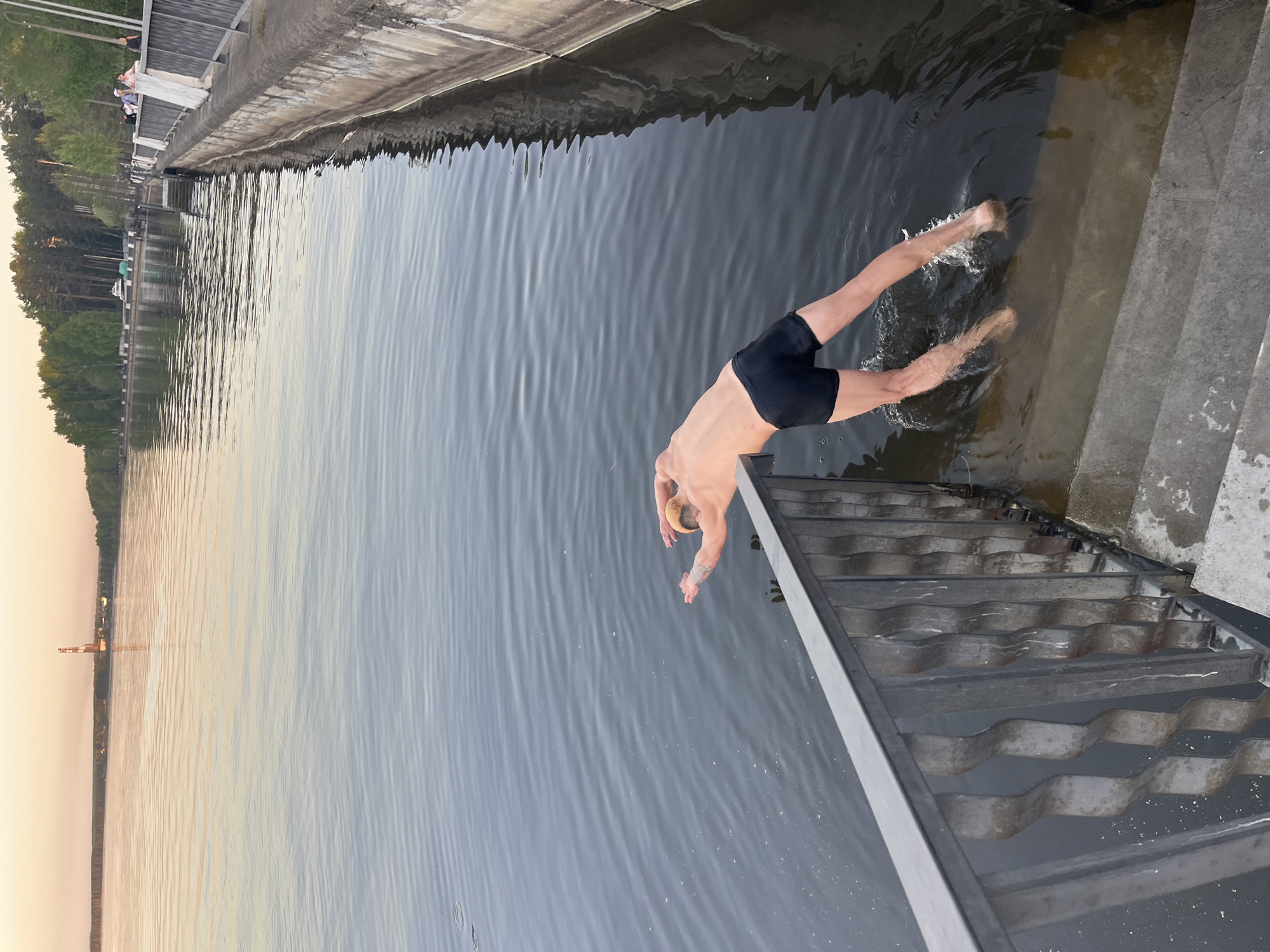 Man dives into water near Chaikovsky, Russia