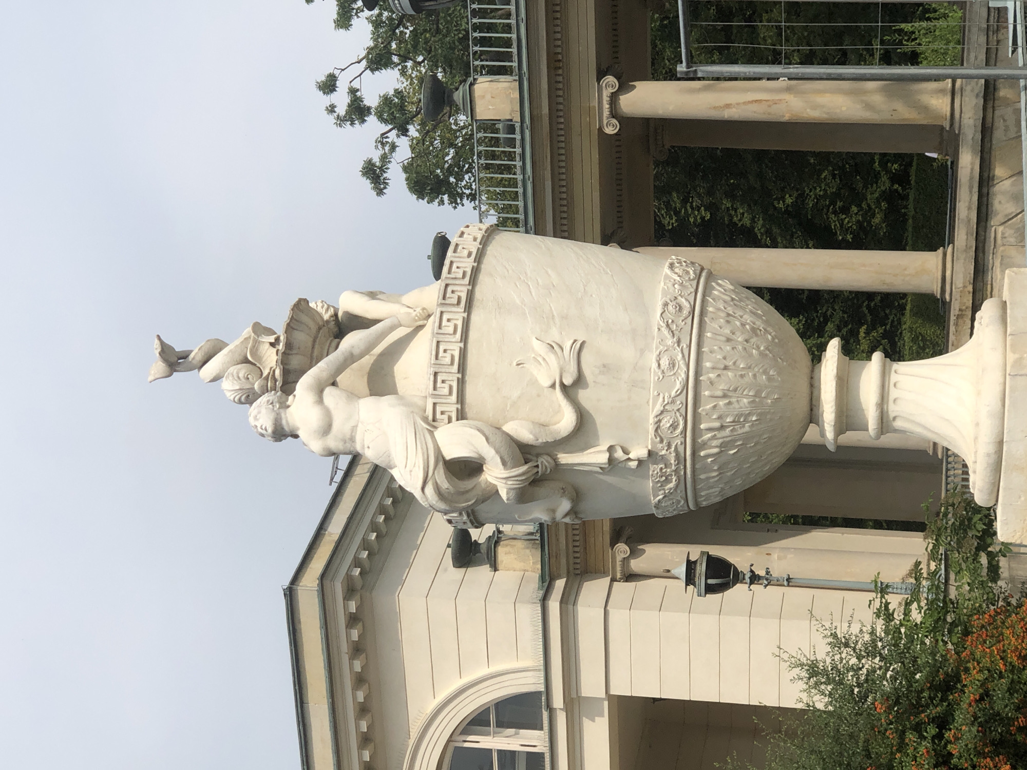 Classical sculptures and palace grounds at Łazienki Park, Warsaw