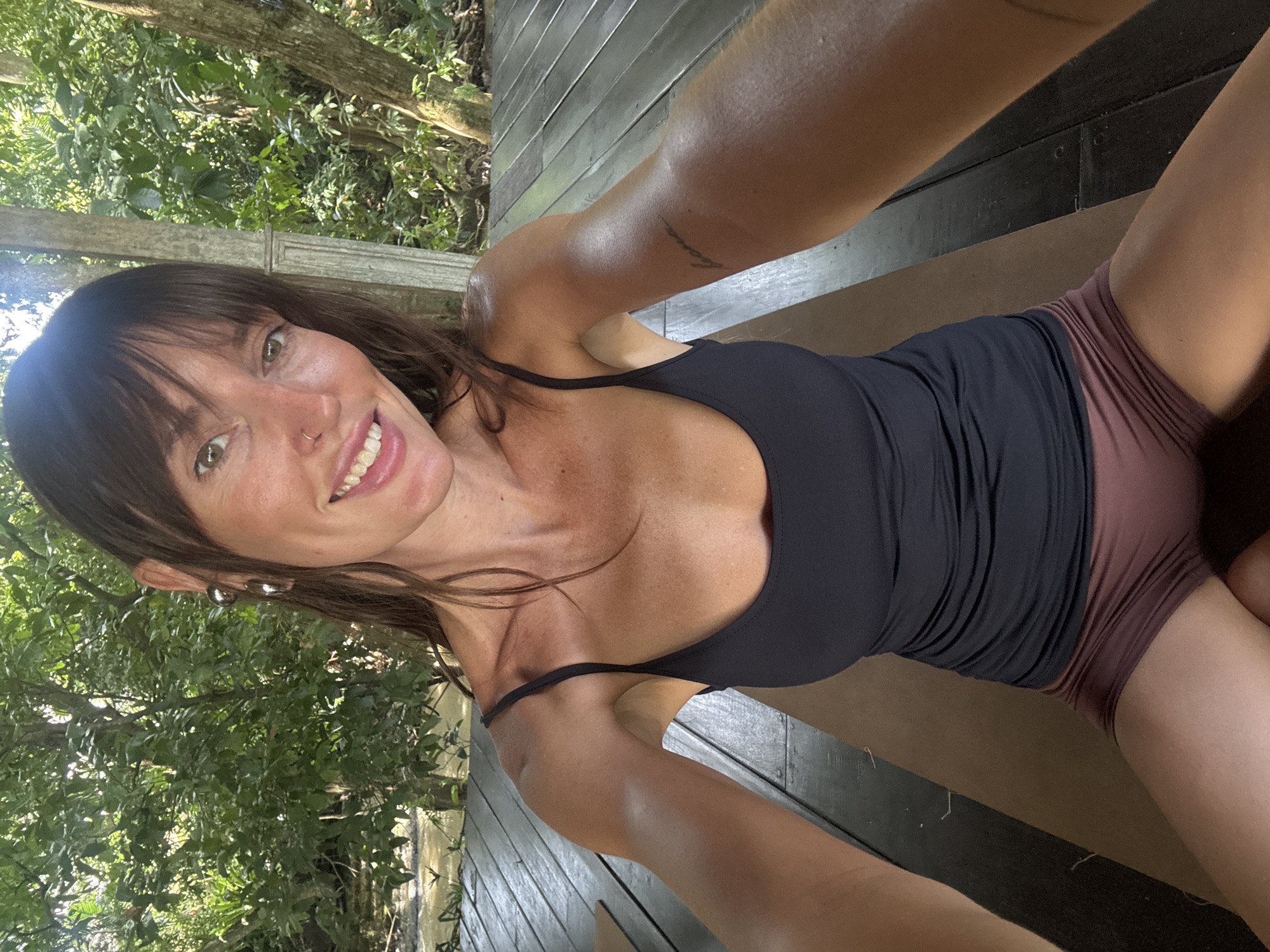 Early morning yoga session held at wooden studio in Mengwi