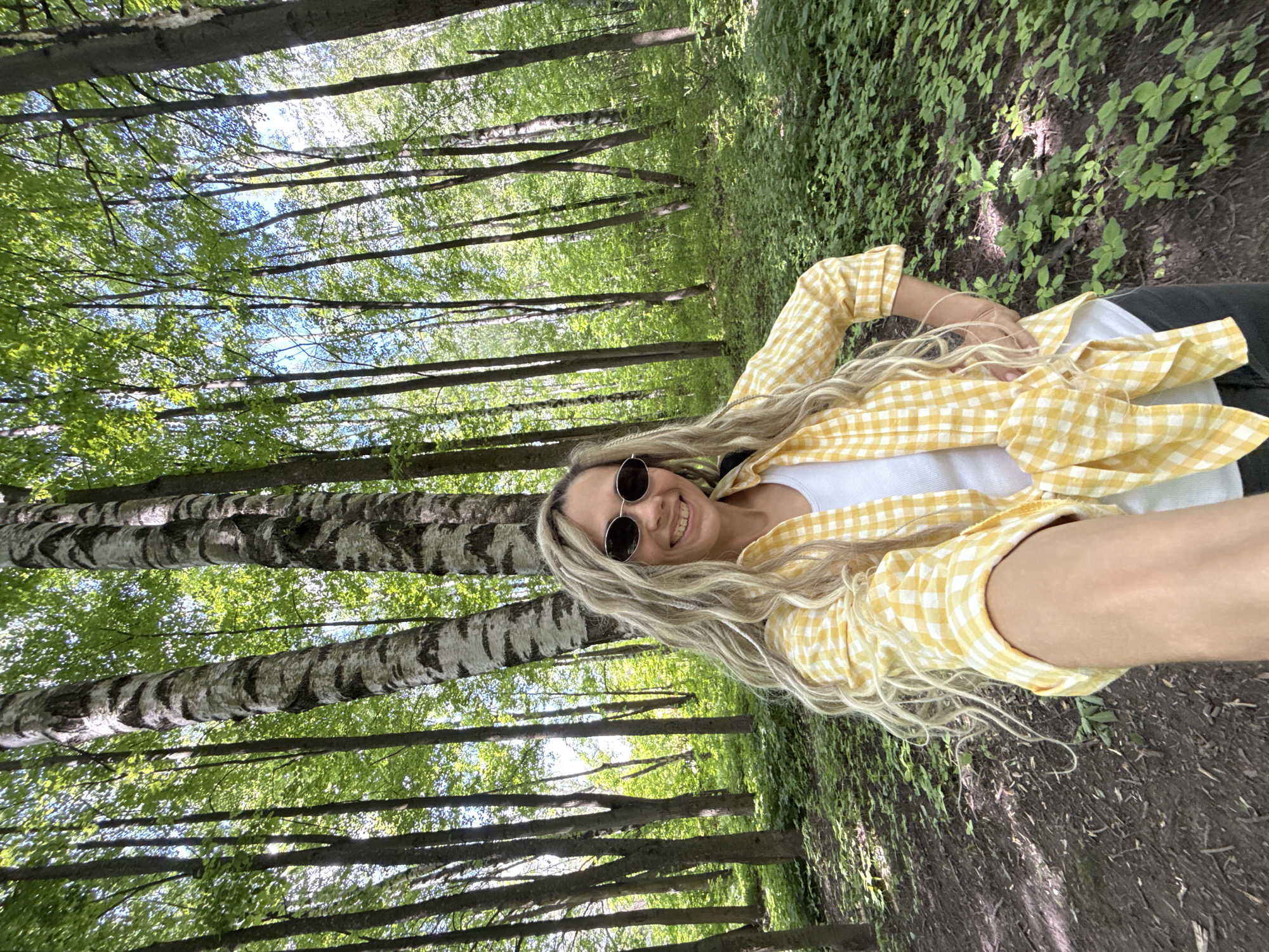 Mother and child enjoy sunny morning park visit in Rusanovo