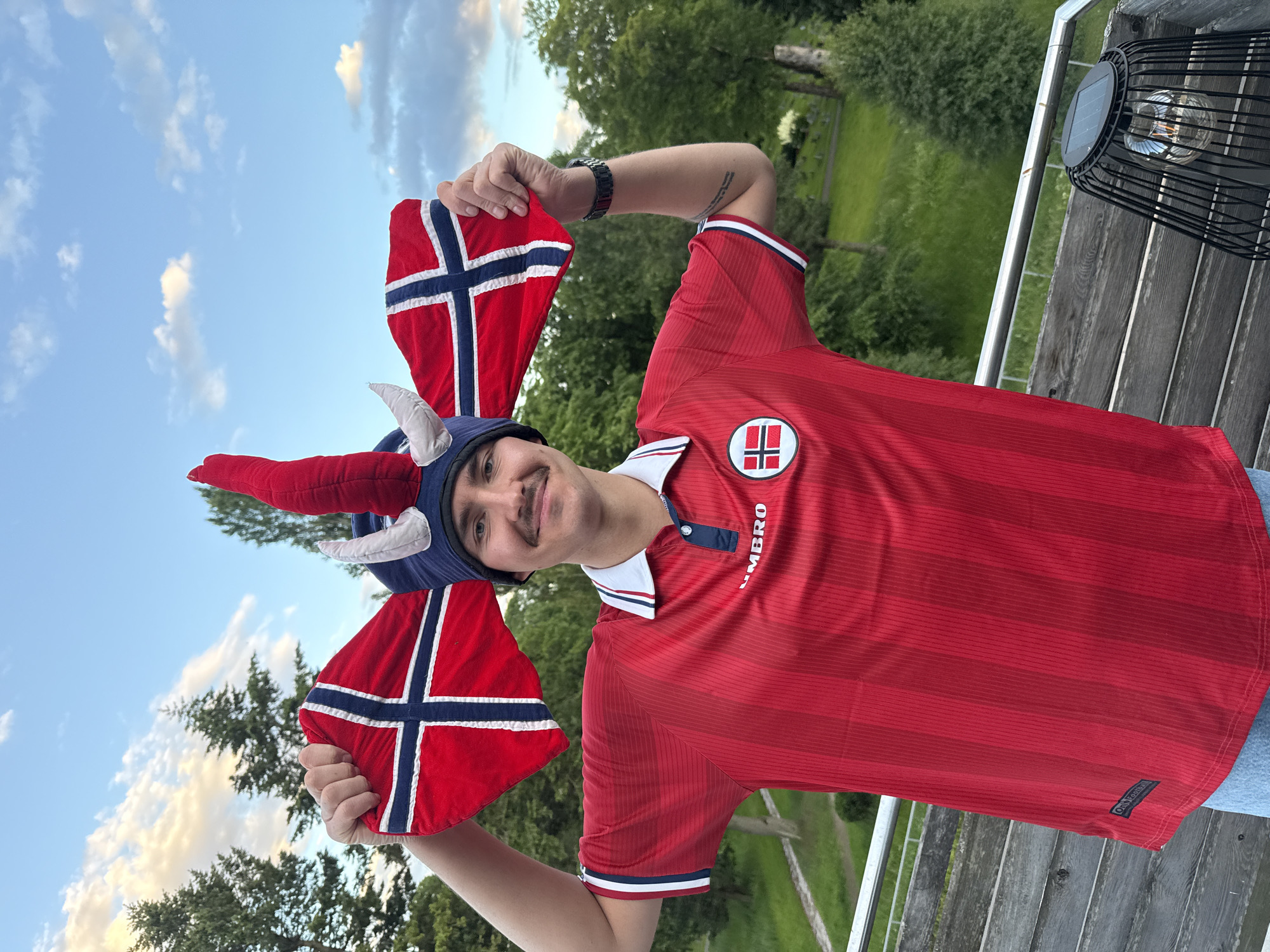 Oslo crew watches football on a bright June evening
